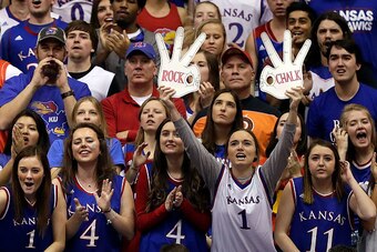LAWRENCE, KS - FEBRUARY 13:  Kansas Jayhawks fans cheer during the game against the West Virginia Mountaineers at Allen Fieldhouse on February 13, 2017 in Lawrence, Kansas.  (Photo by Jamie Squire/Getty Images)