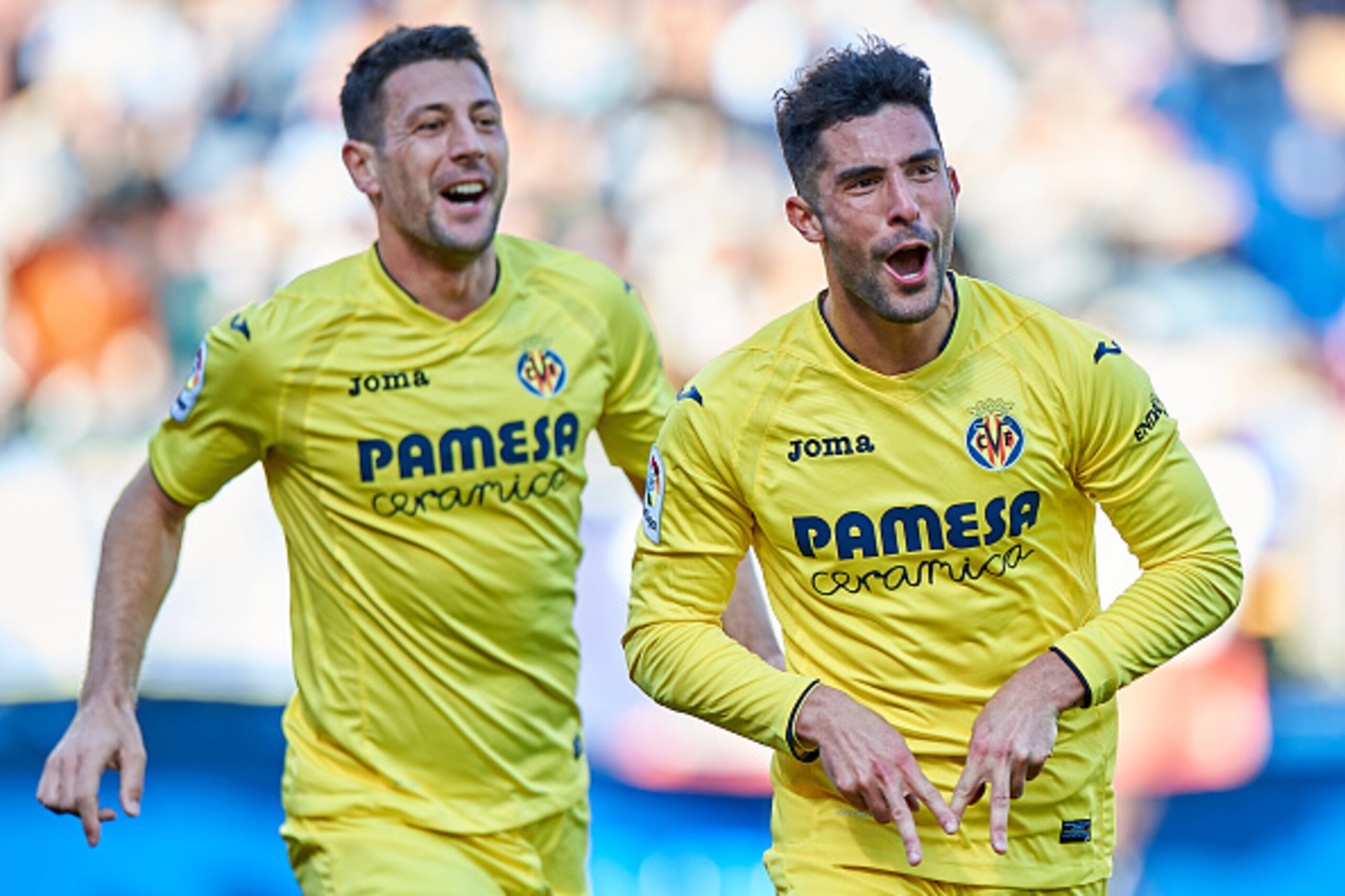 VILLARREAL, SPAIN - JANUARY 28: Alvaro Gonzalez (R) and Daniele Bonera of Villarreal celebrates after scoring the second goal during the La Liga match between Villarreal CF and Granada CF at Estadio de la Ceramica on January 28, 2017 in Villarreal, Spain.