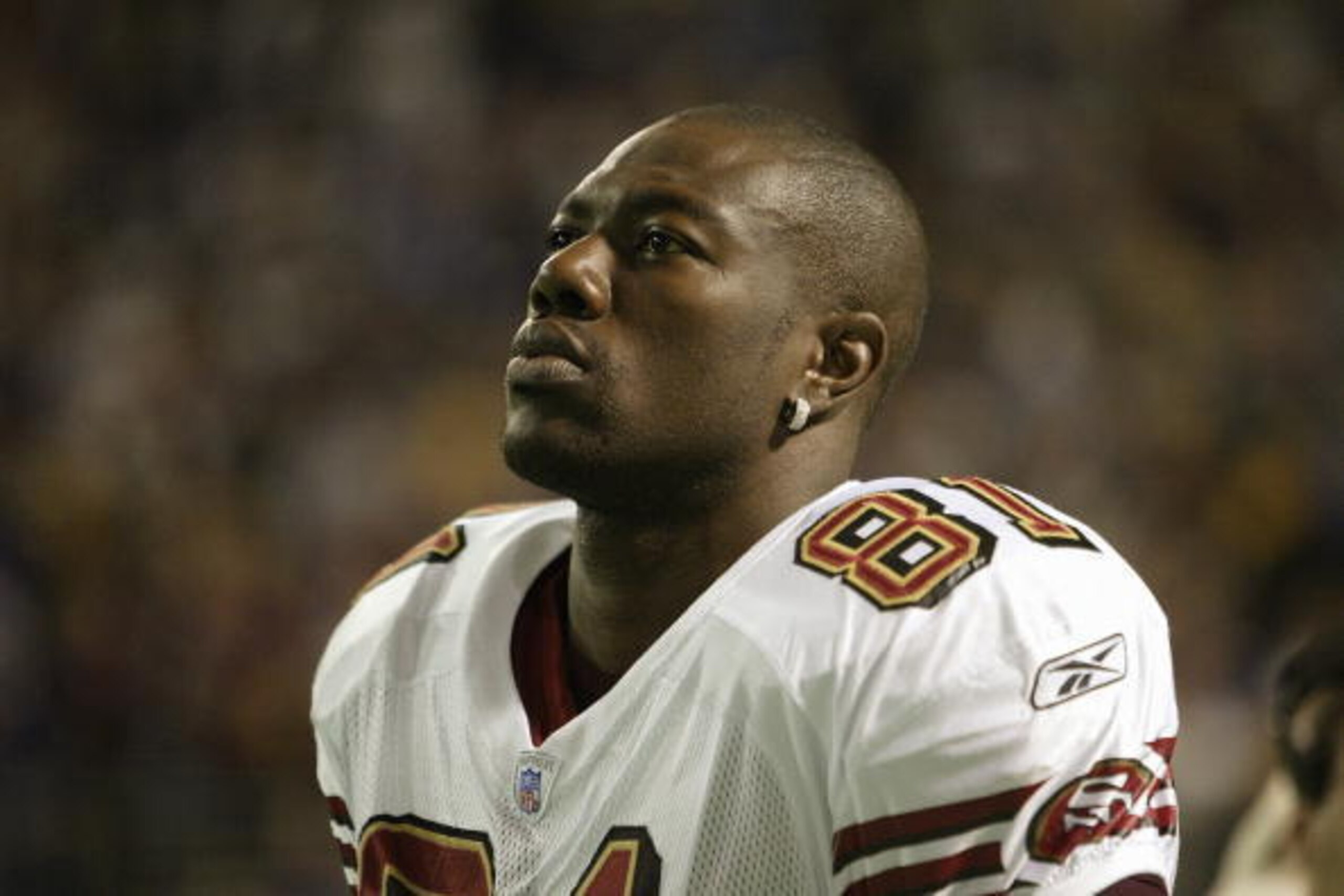 MINNEAPOLIS - SEPTEMBER 28: Wide receiver Terrell Owens #81 of the San Francisco 49ers stands on the sidelines during the game against the Minnesota Vikings at the Hubert H. Humphrey Metrodome on September 28, 2003 in Minneapolis, Minnesota. The Vikings MINNEAPOLIS - SEPTEMBER 28: Wide receiver Terrell Owens #81 of the San Francisco 49ers stands on the sidelines during the game against the Minnesota Vikings at the Hubert H. Humphrey Metrodome on September 28, 2003 in Minneapolis, Minnesota. The Vikings