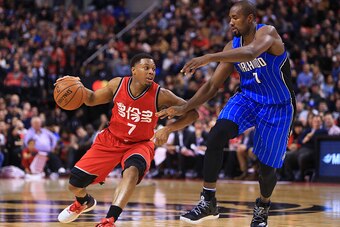 TORONTO, ON - JANUARY 29:  Kyle Lowry #7 of the Toronto Raptors dribbles the ball as Serge Ibaka #7 of the Orlando Magic defends during the second half of an NBA game at Air Canada Centre on January 29, 2017 in Toronto, Canada.  NOTE TO USER: User express