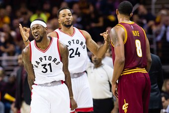CLEVELAND, OH - NOVEMBER 15: Terrence Ross #31 and Norman Powell #24 of the Toronto Raptors celebrate after Ross hit a three to take the lead during the second half against the Cleveland Cavaliers at Quicken Loans Arena on November 15, 2016 in Cleveland, 