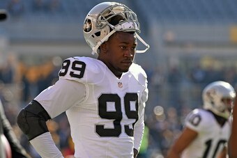 PITTSBURGH, PA - NOVEMBER 8:  Linebacker Aldon Smith #99 of the Oakland Raiders looks on from the field before a game against the Pittsburgh Steelers at Heinz Field on November 8, 2015 in Pittsburgh, Pennsylvania. The Steelers defeated the Raiders 38-35. 