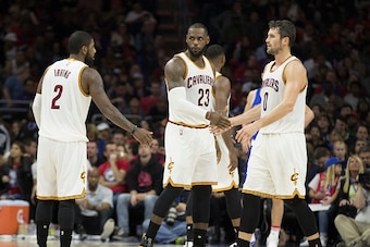 PHILADELPHIA, PA - NOVEMBER 5: LeBron James #23, Kyrie Irving #2, and Kevin Love #0 of the Cleveland Cavaliers celebrate against the Philadelphia 76ers at Wells Fargo Center on November 5, 2016 in Philadelphia, Pennsylvania. The Cavaliers defeated the 76e