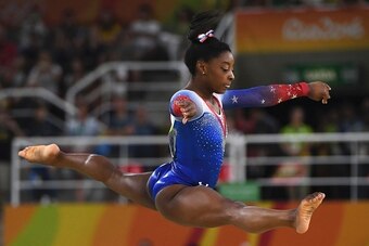 US gymnast Simone Biles competes in the women's floor event final of the Artistic Gymnastics at the Olympic Arena during the Rio 2016 Olympic Games in Rio de Janeiro on August 16, 2016. / AFP / Toshifumi KITAMURA        (Photo credit should read TOSHIFUMI