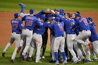 CLEVELAND, OH - NOVEMBER 02:  The Chicago Cubs celebrate after defeating the Cleveland Indians 8-7 in Game Seven of the 2016 World Series at Progressive Field on November 2, 2016 in Cleveland, Ohio. The Cubs win their first World Series in 108 years.  (Ph