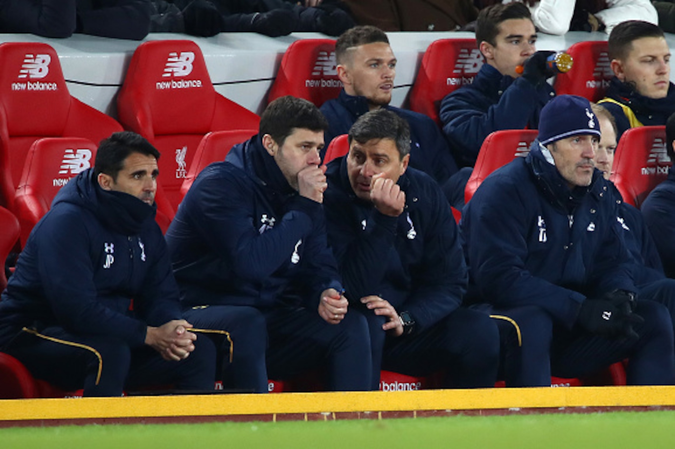 LIVERPOOL, ENGLAND - FEBRUARY 11: Mauricio Pochettino (2nd L), Manager of Tottenham Hotspur  talks with goal keeper coach Toni Jimenez (2nd R) during the Premier League match between Liverpool and Tottenham Hotspur at Anfield on February 11, 2017 in Liver
