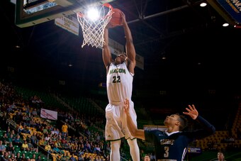 Marquise Moore rises up for a defensive rebound.