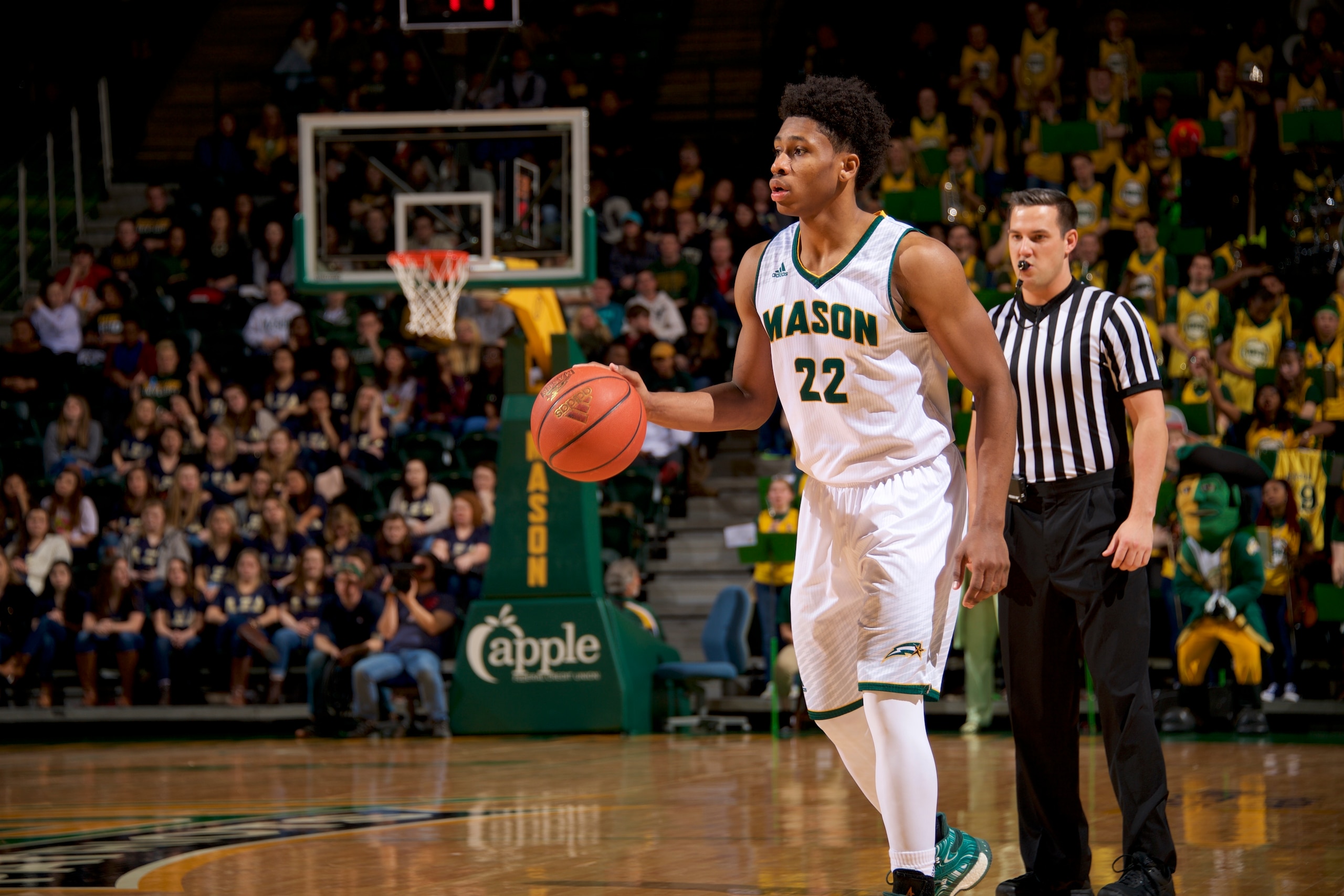 Despite the rebounds, Marquise Moore is a point guard at heart.