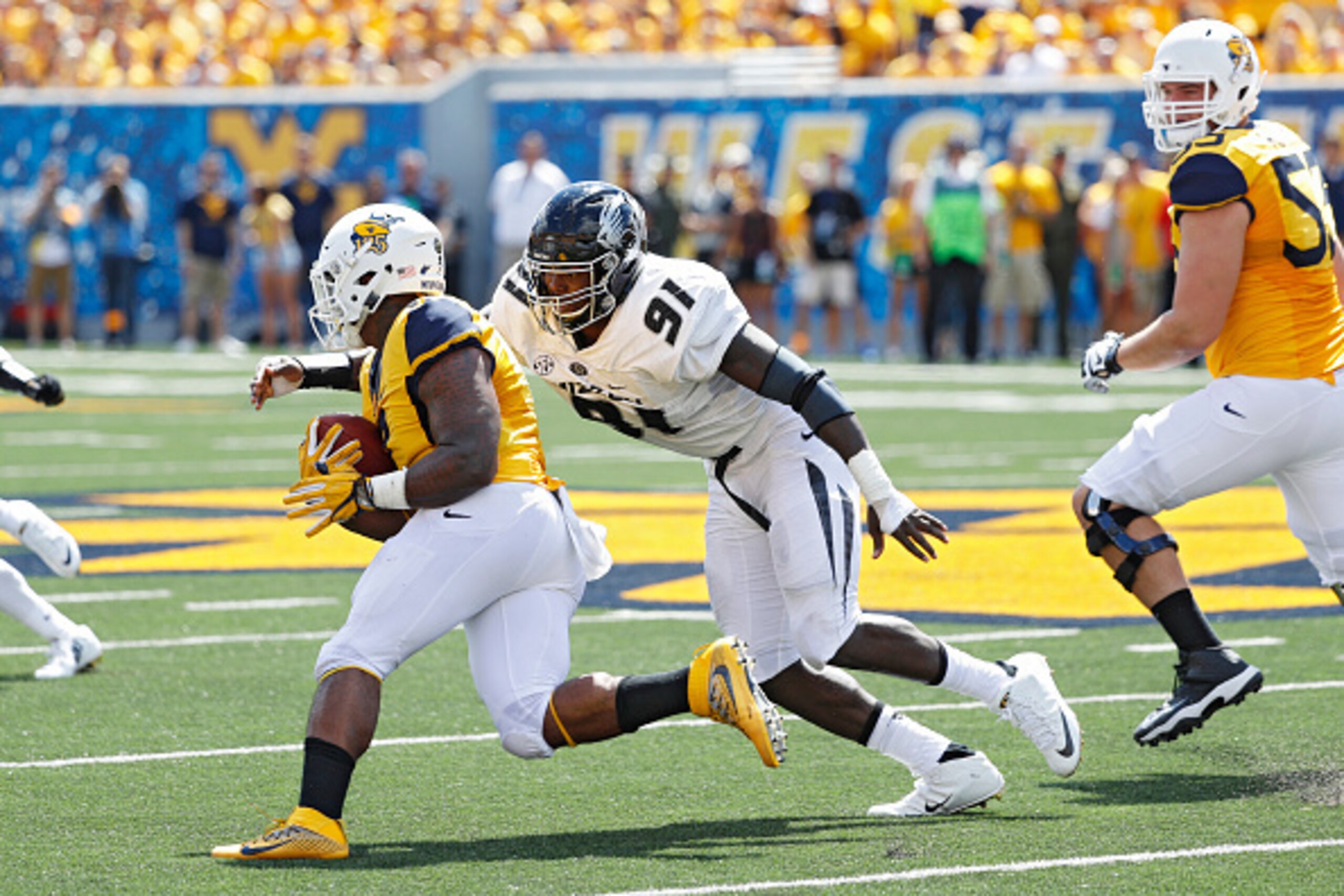 MORGANTOWN, WV - SEPTEMBER 03: Charles Harris #91 of the Missouri Tigers in action against the West Virginia Mountaineers during a game at Milan Puskar Stadium on September 3, 2016 in Morgantown, West Virginia. West Virginia defeated Missouri 26-11. (Phot
