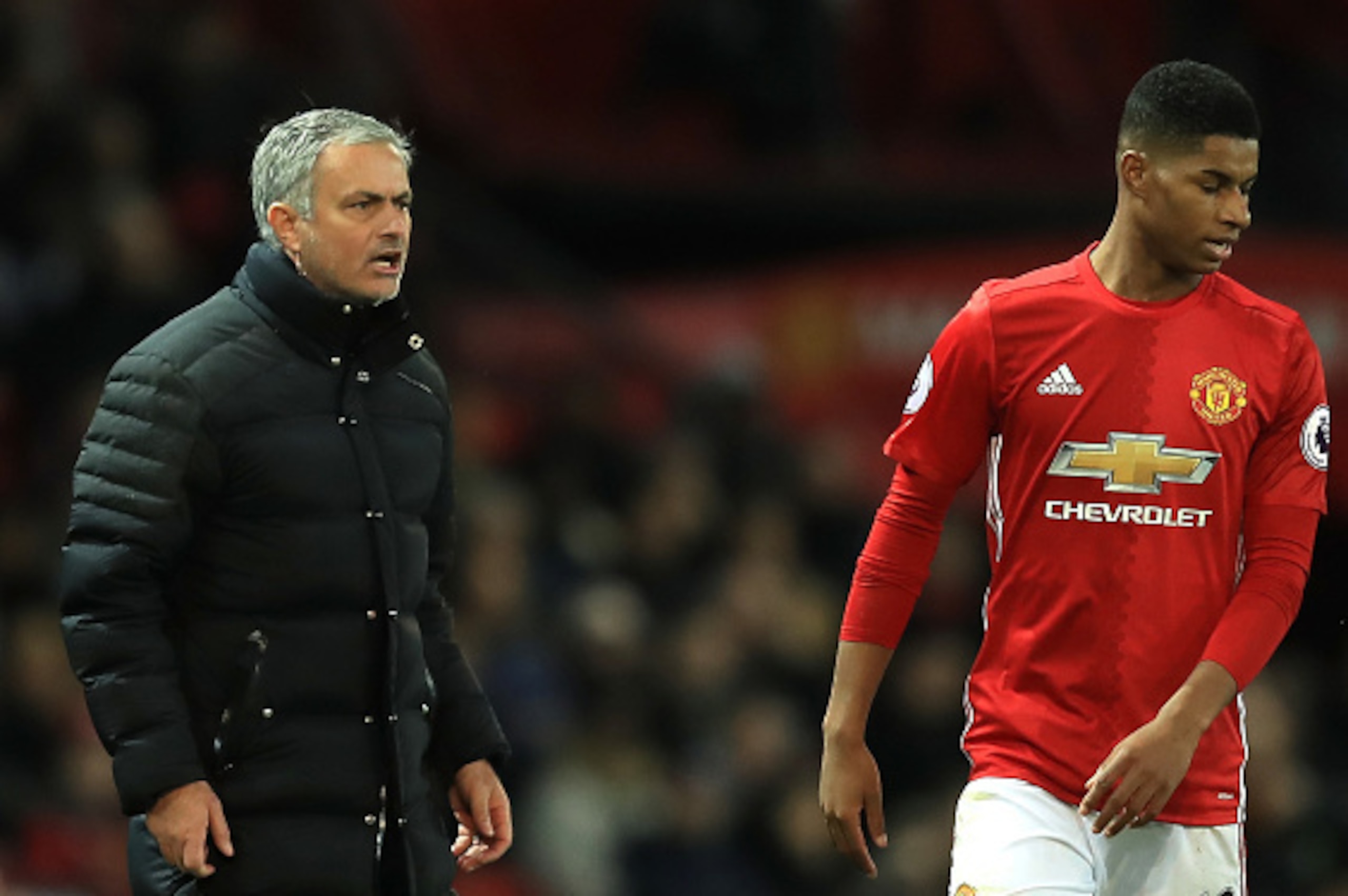 MANCHESTER, ENGLAND - DECEMBER 11: Jose Mourinho, Manager of Manchester United gives instruction to Marcus Rashford during the Premier League match between Manchester United and Tottenham Hotspur at Old Trafford on December 11, 2016 in Manchester, England