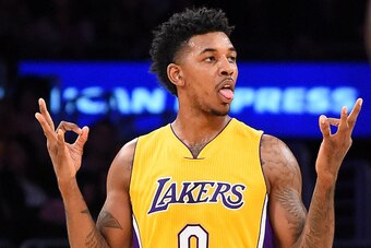 LOS ANGELES, CA - FEBRUARY 14:   Nick Young #0 of the Los Angeles Lakers gestures after a three-point basket in the first half of the game against the Sacramento Kings at Staples Center on February 14, 2017 in Los Angeles, California. NOTE TO USER: User e