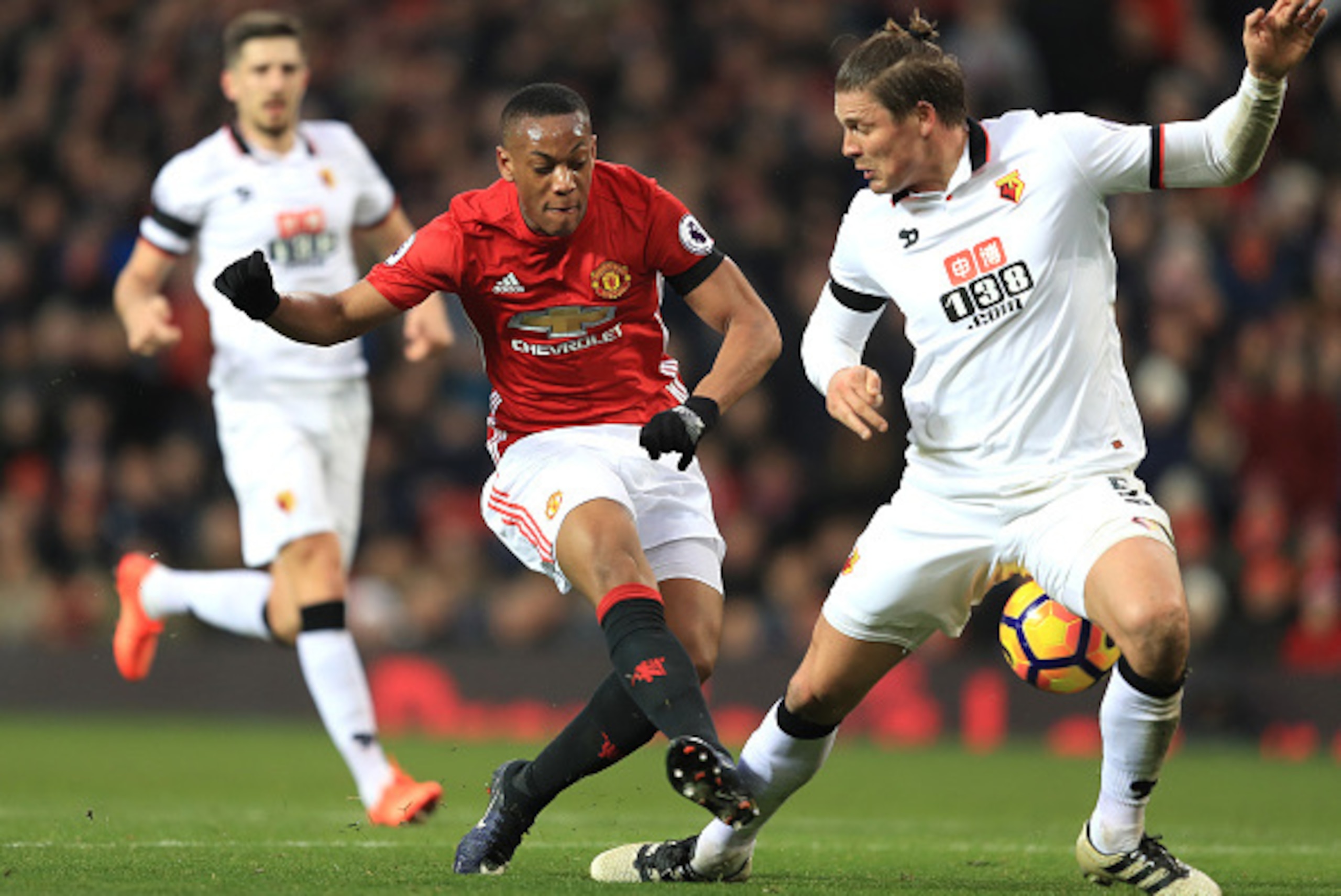 MANCHESTER, ENGLAND - FEBRUARY 11:  Anthony Martial of Manchester United takes on Sebastian Prodl of Watford during the Premier League match between Manchester United and Watford at Old Trafford on February 11, 2017 in Manchester, England.  (Photo by Rich