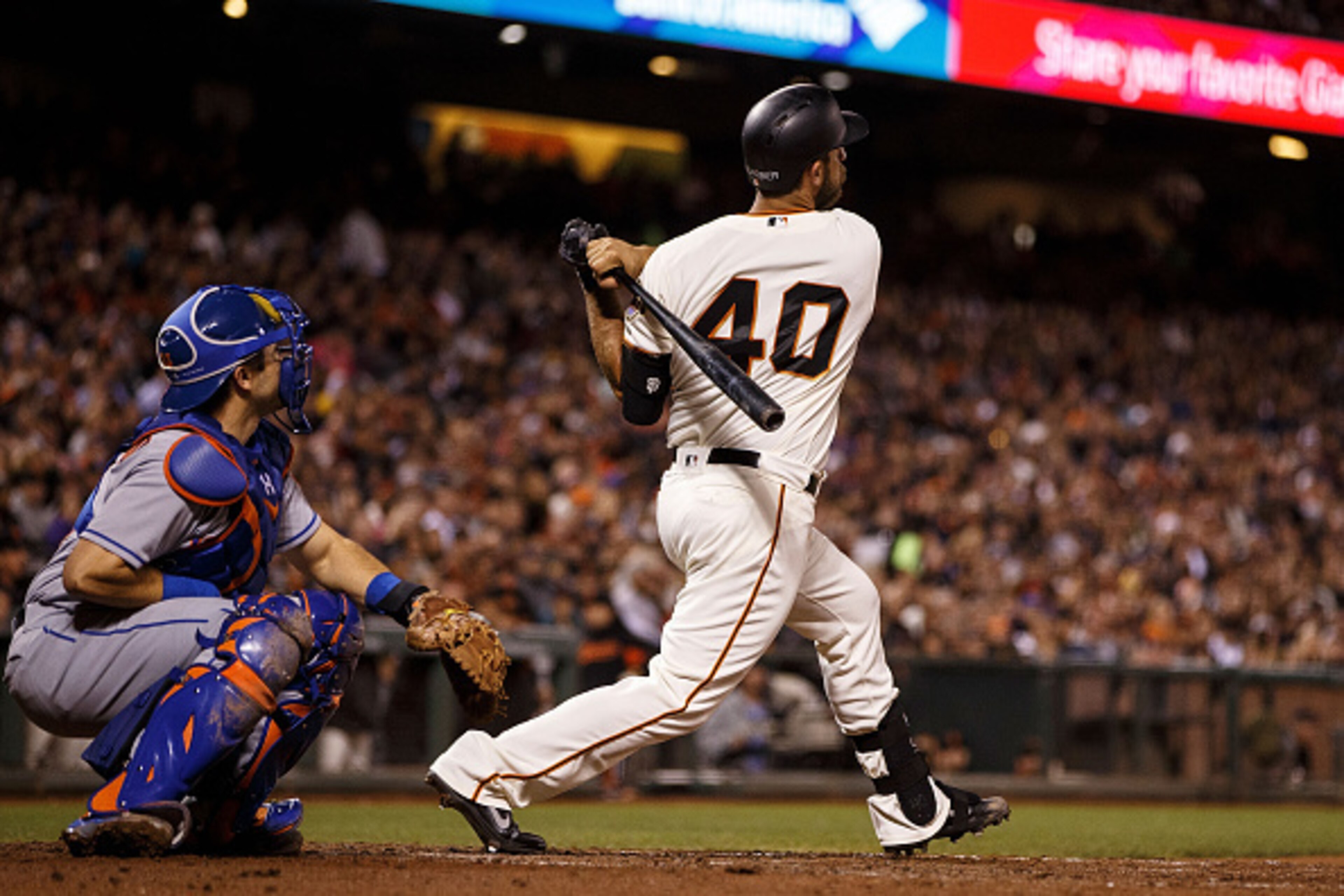 SAN FRANCISCO, CA - AUGUST 18: Madison Bumgarner #40 of the San Francisco Giants hits a two run home run against the New York Mets during the fourth inning at AT&T Park on August 18, 2016 in San Francisco, California. The San Francisco Giants defeated the