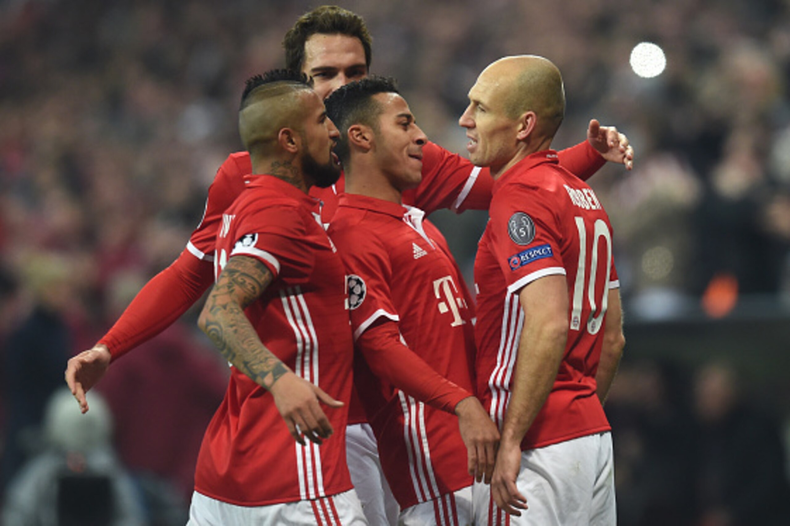 (L-R) Bayern Munich's Chilian midfielder Arturo Vidal, Bayern MunichÕs defender Mats Hummels, Bayern Munich's Spanish midfielder Thiago Alcantara and Bayern Munich's Dutch midfielder Arjen Robben celebrate after the first goal during the UEFA Champions Le (L-R) Bayern Munich's Chilian midfielder Arturo Vidal, Bayern MunichÕs defender Mats Hummels, Bayern Munich's Spanish midfielder Thiago Alcantara and Bayern Munich's Dutch midfielder Arjen Robben celebrate after the first goal during the UEFA Champions Le