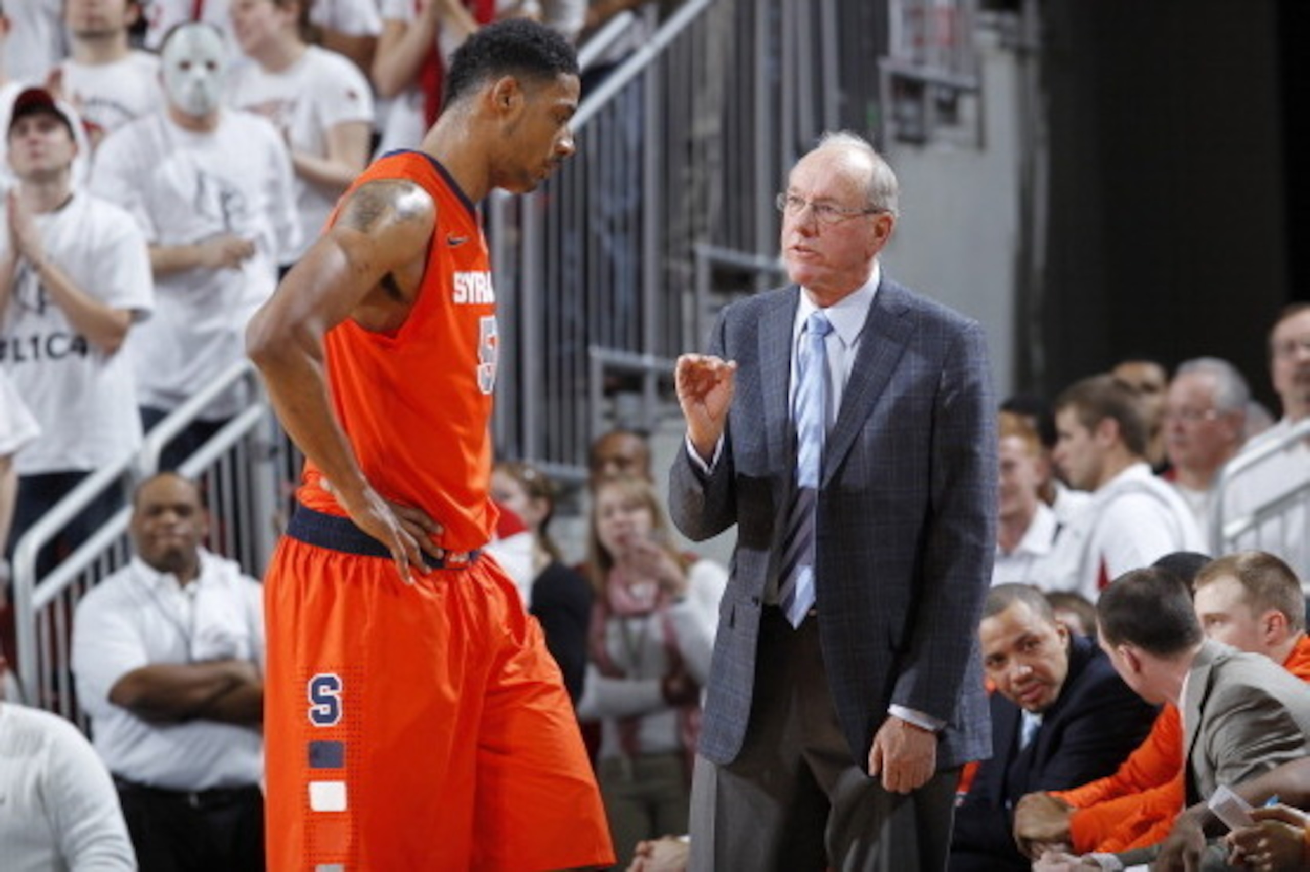 LOUISVILLE, KY - FEBRUARY 13: Fab Melo #51 of the Syracuse Orange talks with head coach Jim Boeheim during the game against the Louisville Cardinals at KFC Yum! Center on February 13, 2012 in Louisville, Kentucky. Syracuse won 52-51. (Photo by Joe Robbins
