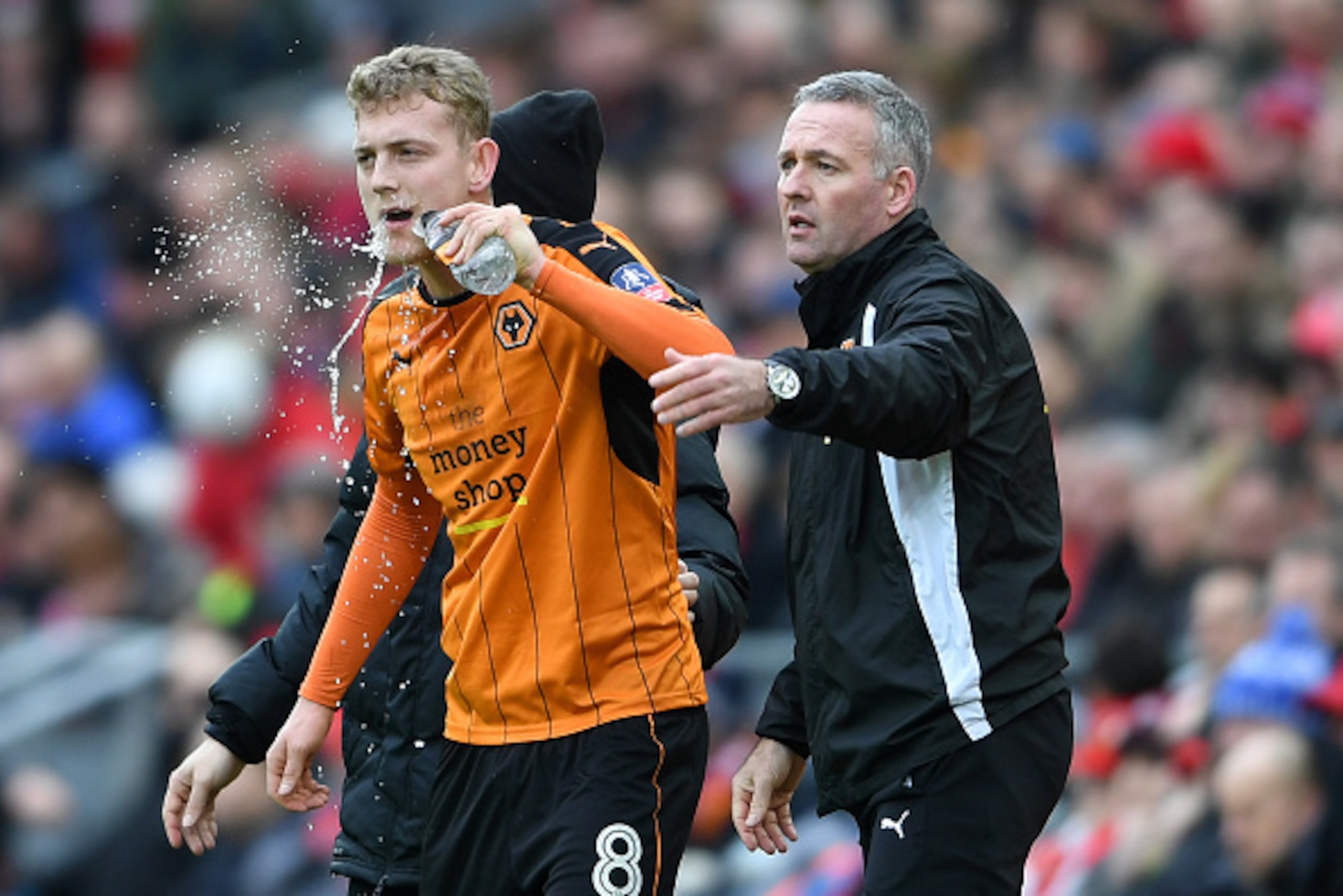 LIVERPOOL, ENGLAND - JANUARY 28: George Saville of Wolverhampton Wanderers and Paul Lambert manager / head coach of Wolverhampton Wanderers during The Emirates FA Cup Fourth Round between Liverpool and Wolverhampton Wanderers at Anfield on January 28, 201