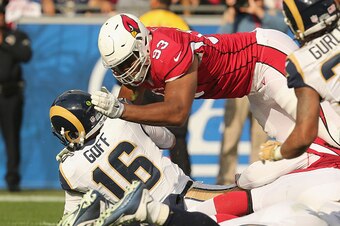 LOS ANGELES, CA - JANUARY 01:  Defensive lineman Calais Campbell #93 of the Arizona Cardinals gets in on a sack of quarterback Jarod Goff #16 of the Los Angeles Rams at Los Angeles Memorial Coliseum on January 1, 2017 in Los Angeles, California.  The Card