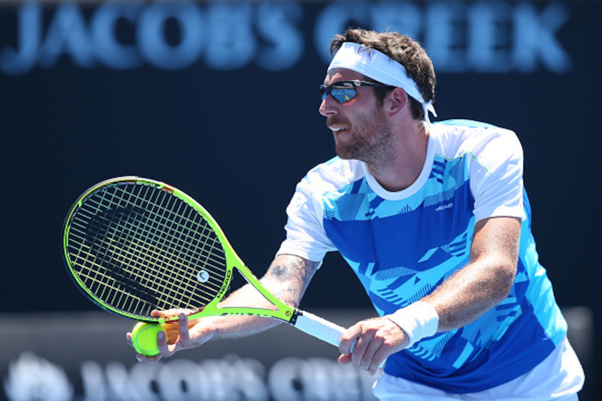 MELBOURNE, AUSTRALIA - JANUARY 16:  Gerald Melzer of Austria serves in his first round match against Alex De Minaur of Australia on day one of the 2017 Australian Open at Melbourne Park on January 16, 2017 in Melbourne, Australia.  (Photo by Michael Dodge