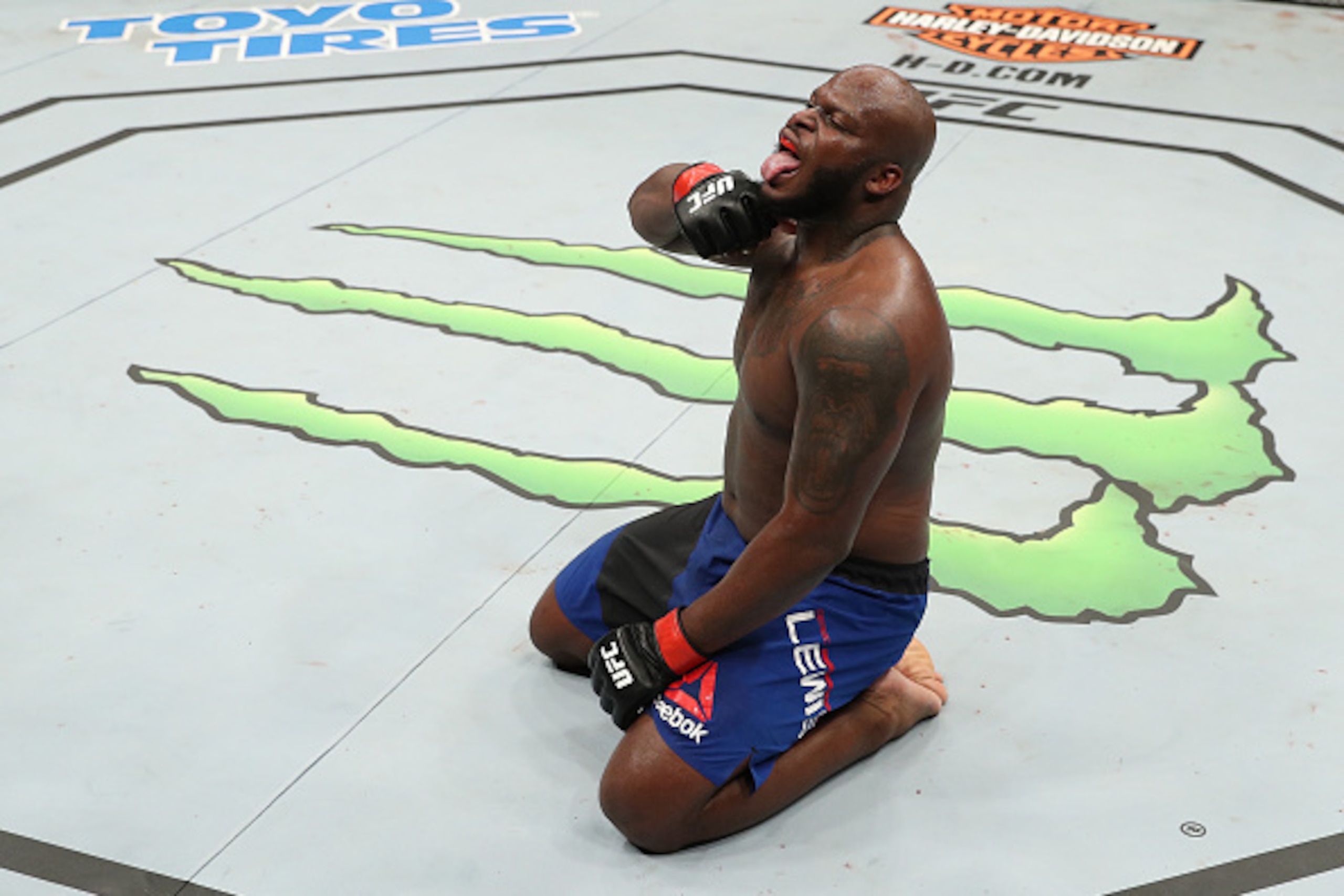 ALBANY, NY - DECEMBER 09:  Derrick Lewis celebrates after his TKO victory over Shamil Abdurakhimov of Russia in their heavyweight bout during the UFC Fight Night event at the Times Union Center on December 9, 2016 in Albany, New York. (Photo by Patrick Sm