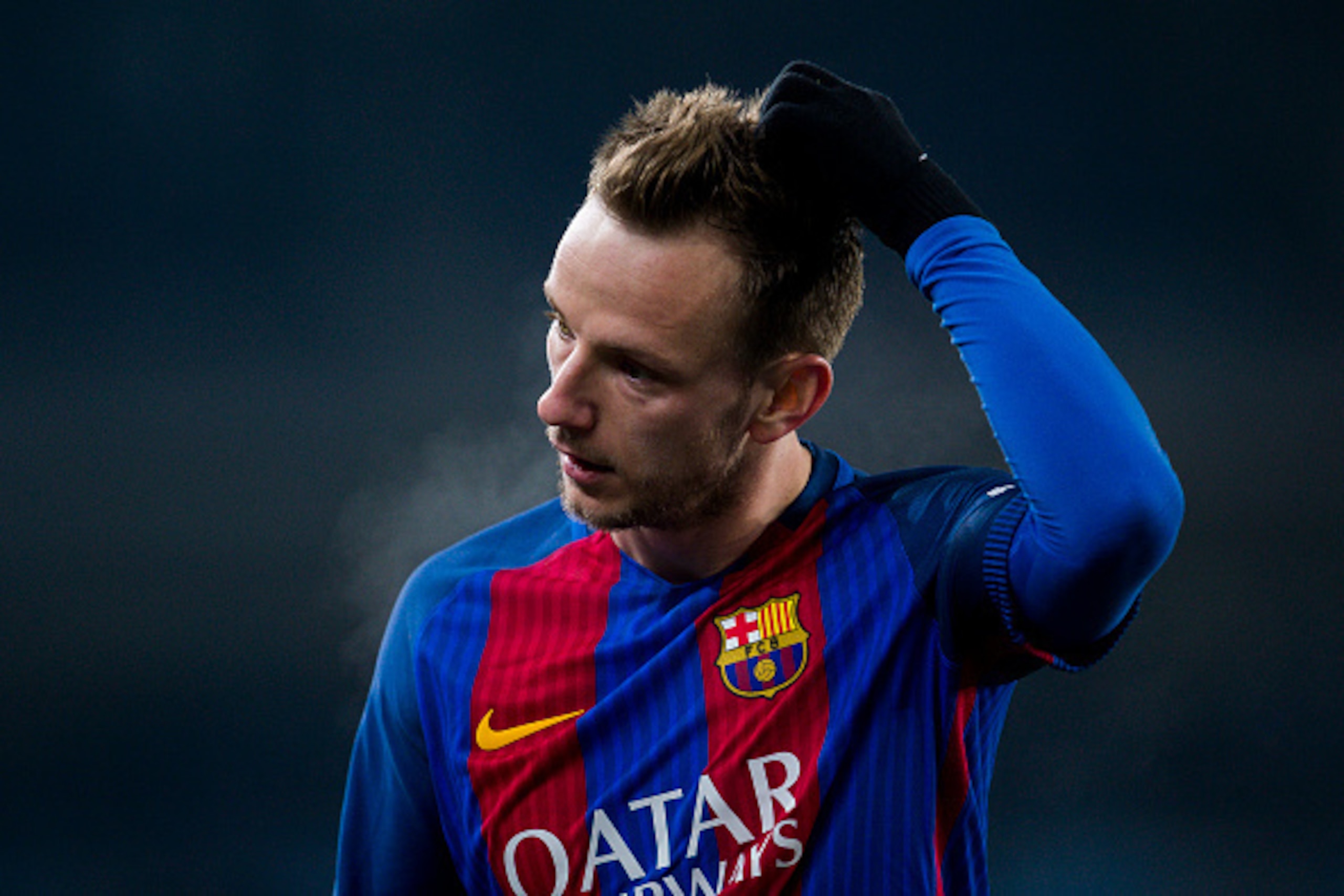 SAN SEBASTIAN, SPAIN - JANUARY 19:  Ivan Rakitic of FC Barcelona reacts during the Copa del Rey Quarter Final, First Leg match between Real Sociedad de Futbol and FC Barcelona at Estadio Anoeta on January 19, 2017 in San Sebastian, Spain.  (Photo by Juan 