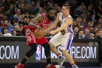 PHILADELPHIA, PA - JANUARY 27: James Harden #13 of the Houston Rockets dribbles the ball against T.J. McConnell #1 of the Philadelphia 76ers in the first quarter at the Wells Fargo Center on January 27, 2017 in Philadelphia, Pennsylvania.  NOTE TO USER: U
