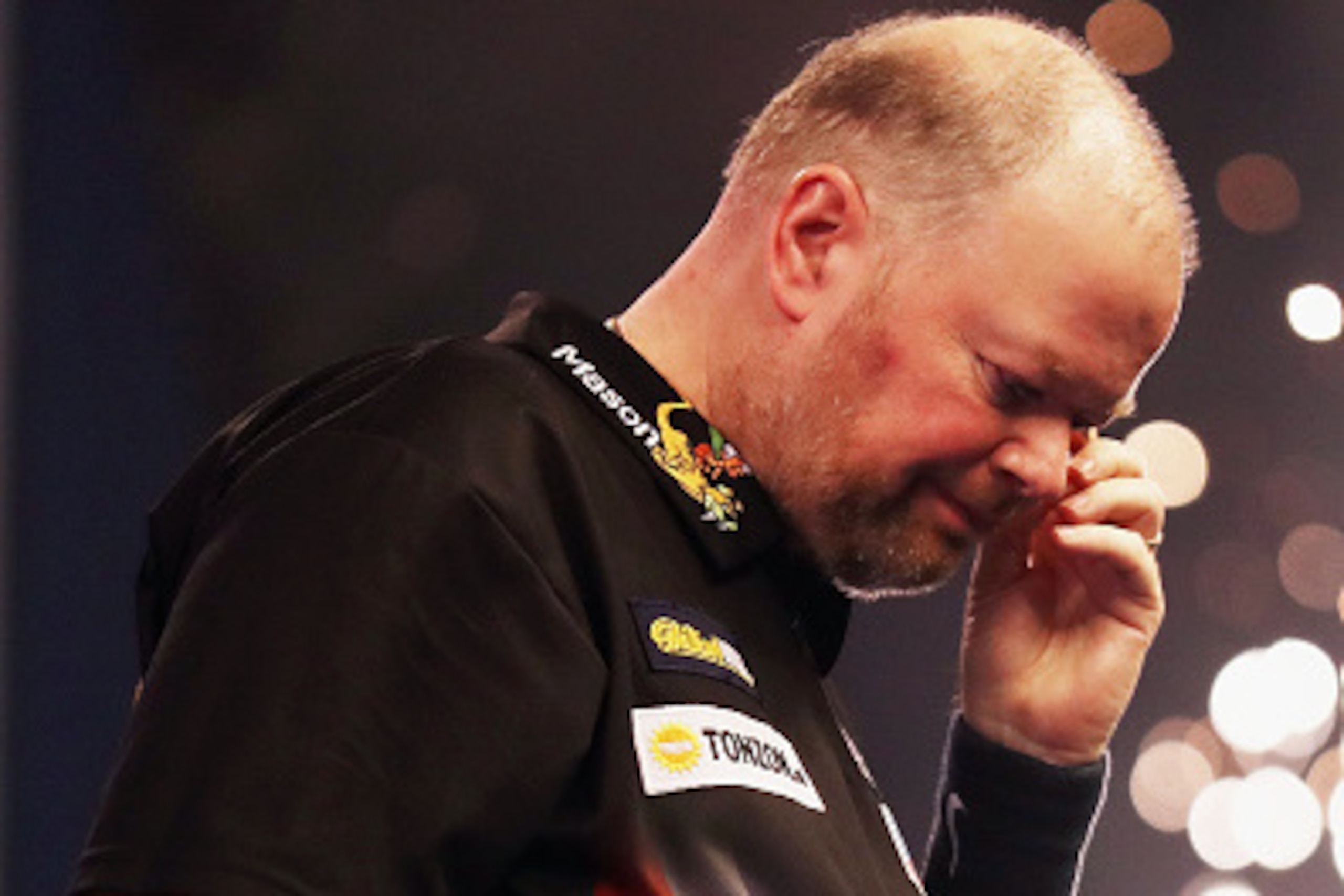 LONDON, ENGLAND - JANUARY 01:  Raymond van Barneveld of The Netherlands lost to Michael van Gerwen of The Netherlands in their semi-final on day fourteen of the 2017 William Hill PDC World Darts Championships at Alexandra Palace on January 1, 2017 in Lond