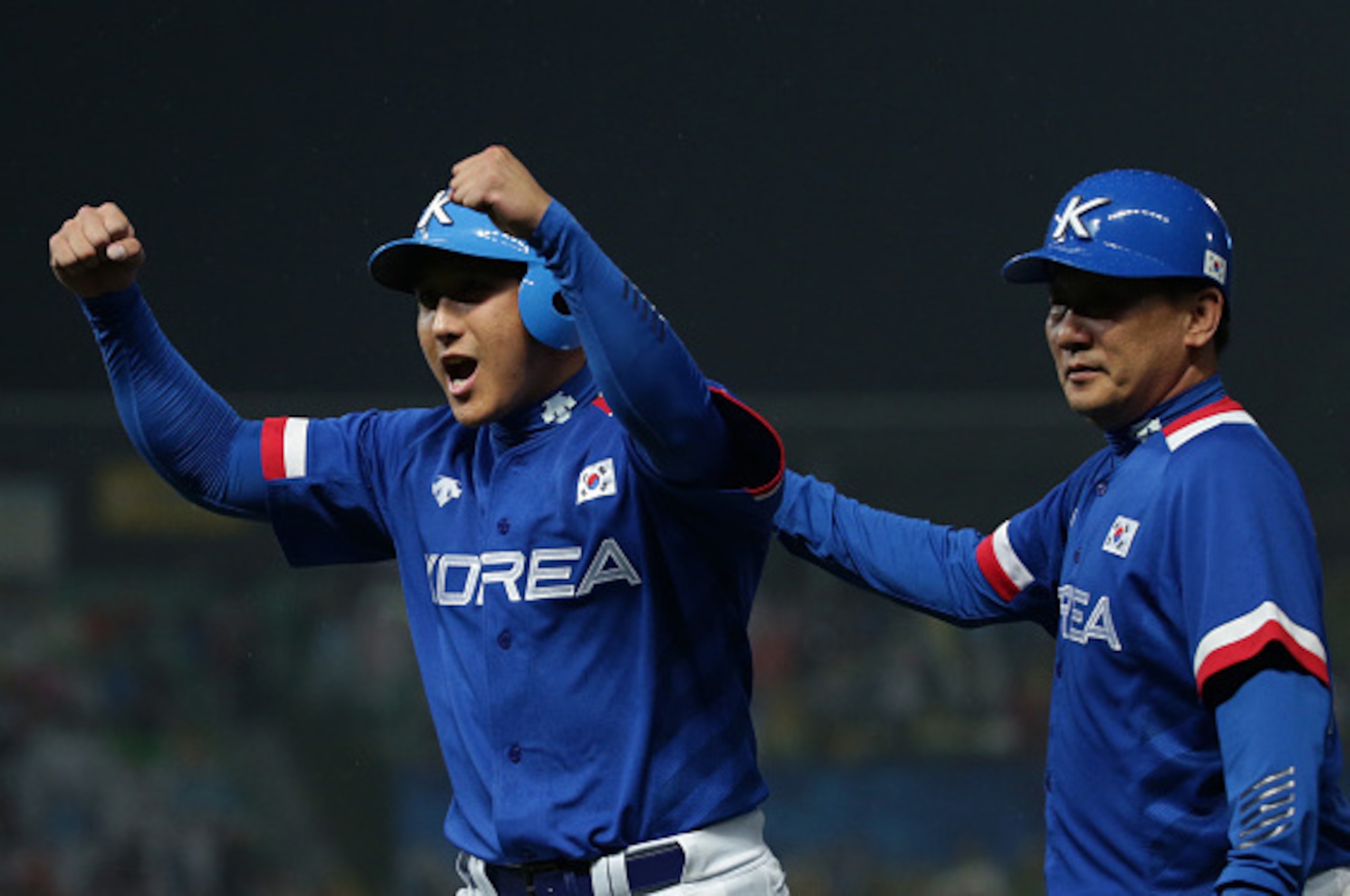 INCHEON, SOUTH KOREA - SEPTEMBER 28: Hwang Jae-Gyun of South Korea celebrates after hits a RBI double in the eighth inning during the Baseball Final between South Korea and Chinese Taipei during the day nine of the 2014 Asian Games at Munhak Stadium on S INCHEON, SOUTH KOREA - SEPTEMBER 28: Hwang Jae-Gyun of South Korea celebrates after hits a RBI double in the eighth inning during the Baseball Final between South Korea and Chinese Taipei during the day nine of the 2014 Asian Games at Munhak Stadium on S