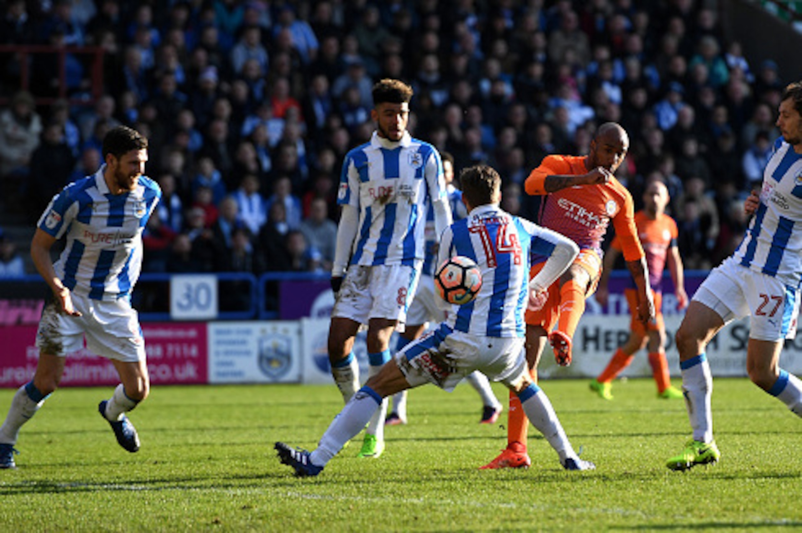 HUDDERSFIELD, ENGLAND - FEBRUARY 18: Fabian Delph of Manchester City shoots during The Emirates FA Cup Fifth Round match between Huddersfield Town and Manchester City at John Smith's Stadium on February 18, 2017 in Huddersfield, England.  (Photo by Gareth