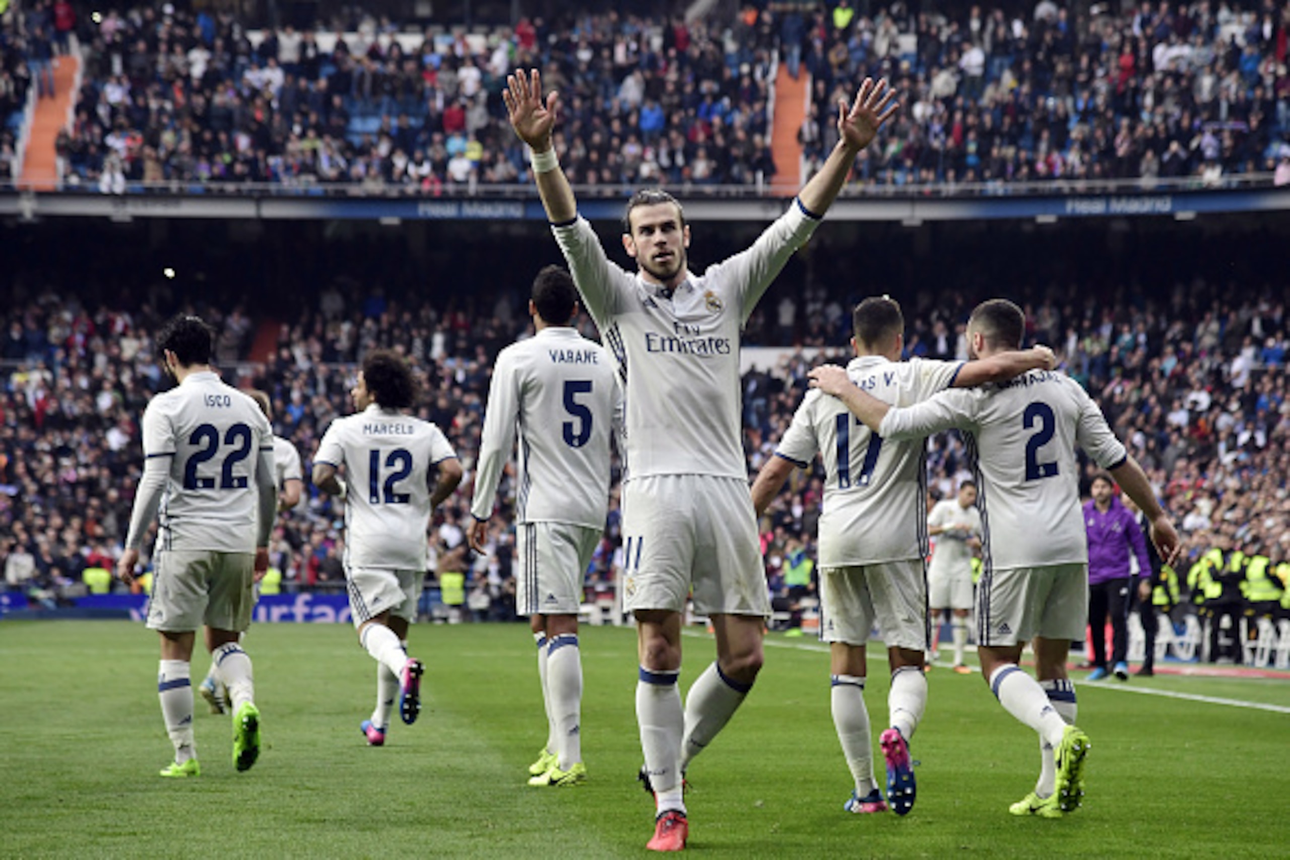 Real Madrid's Welsh forward Gareth Bale celebrates a goal during the Spanish league football match Real Madrid CF vs RCD Espanyol at the Santiago Bernabeu stadium in Madrid on February 18, 2017. / AFP / JAVIER SORIANO        (Photo credit should read JAVI