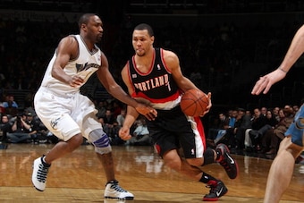 WASHINGTON - DECEMBER 3: Brandon Roy #7 of the Portland Trail Blazers drives against Gilbert Arenas #9 of the Washington Wizards at the Verizon Center on December 3, 2010 in Washington, DC. NOTE TO USER: User expressly acknowledges and agrees that, by dow