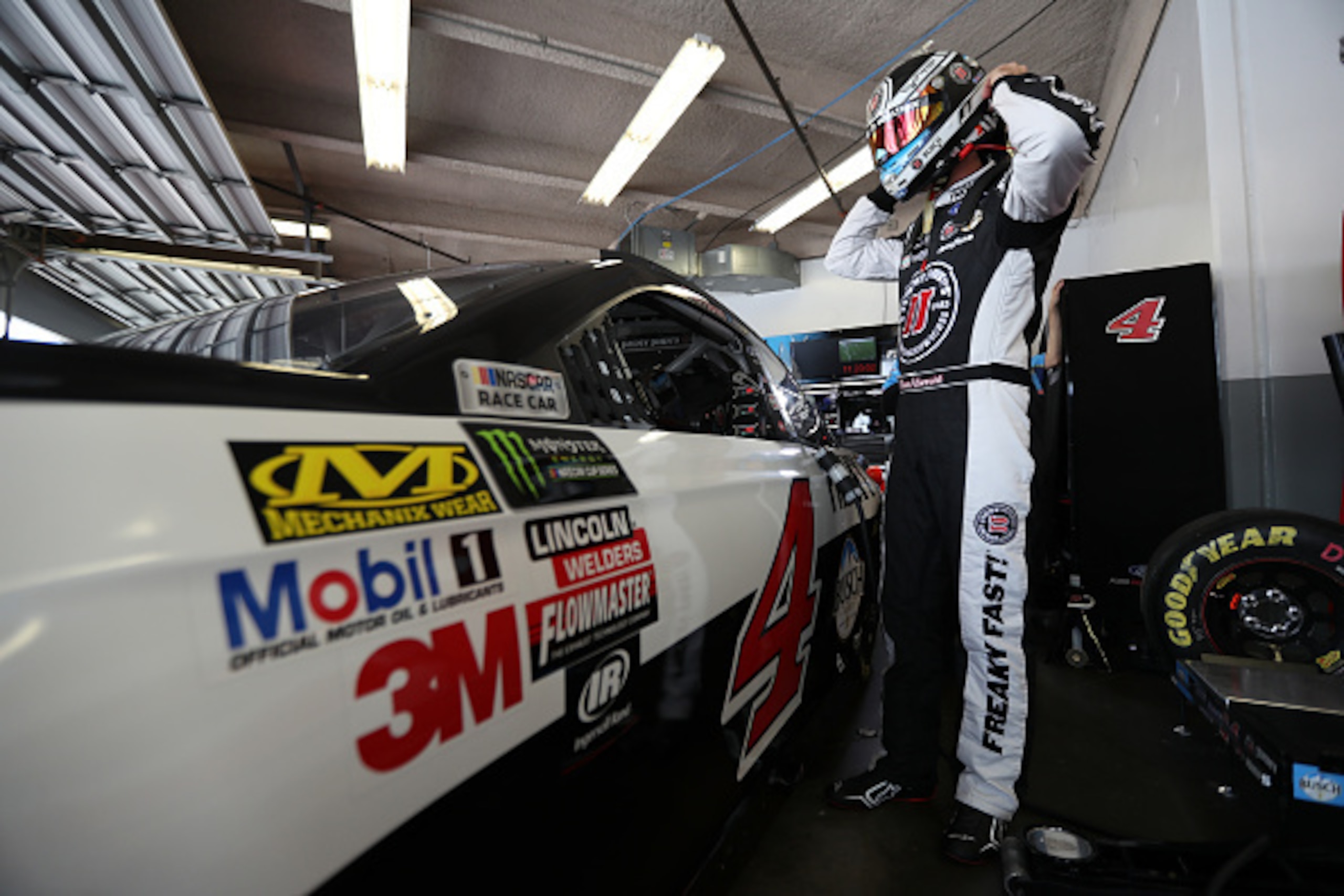 DAYTONA BEACH, FL - FEBRUARY 18: Kevin Harvick, driver of the #4 Jimmy John's Ford, stands in the garage area during practice for the Monster Energy NASCAR Cup Series 59th Annual DAYTONA 500 at Daytona International Speedway on February 18, 2017 in Dayto DAYTONA BEACH, FL - FEBRUARY 18: Kevin Harvick, driver of the #4 Jimmy John's Ford, stands in the garage area during practice for the Monster Energy NASCAR Cup Series 59th Annual DAYTONA 500 at Daytona International Speedway on February 18, 2017 in Dayto