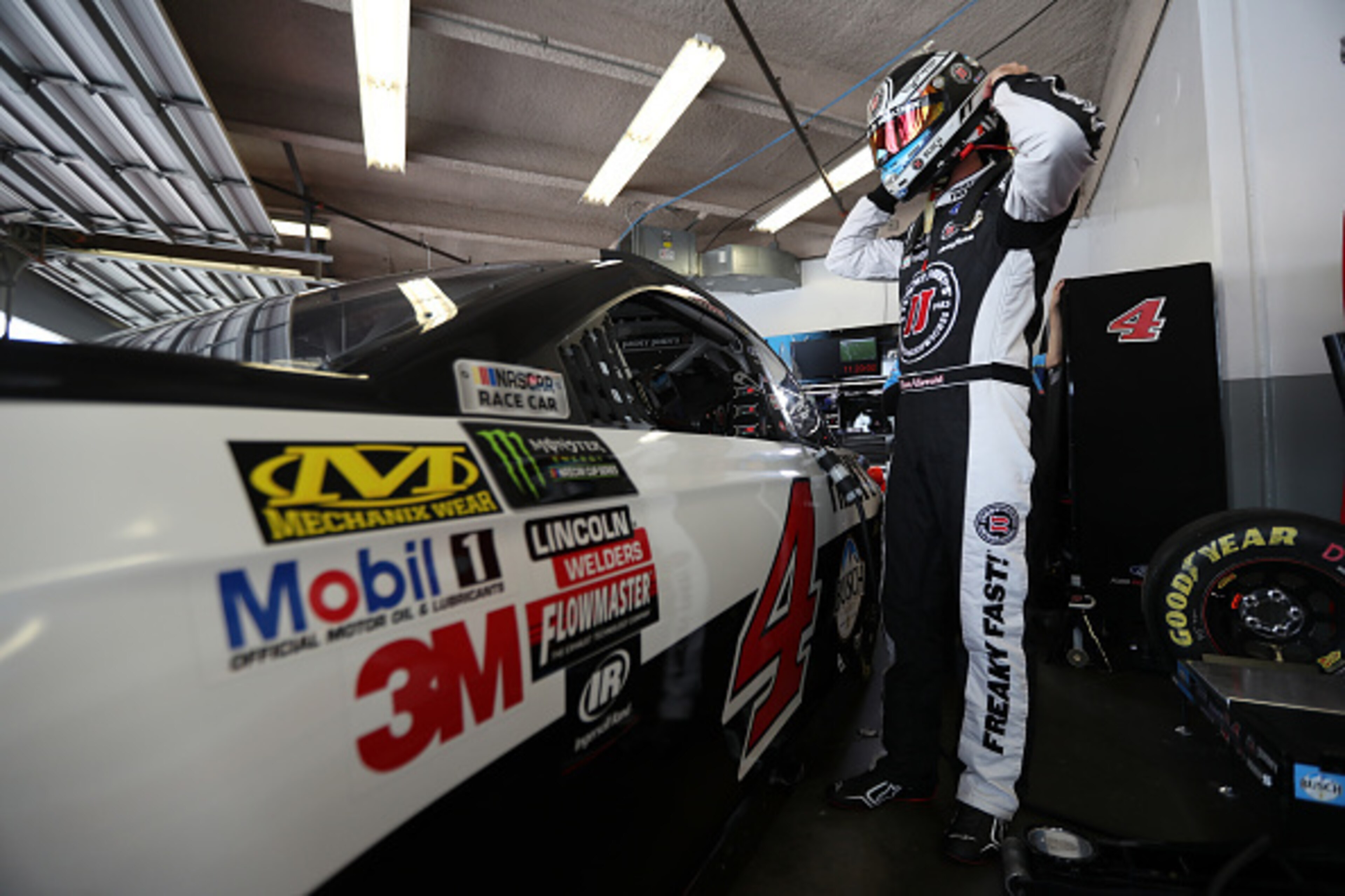 DAYTONA BEACH, FL - FEBRUARY 18: Kevin Harvick, driver of the #4 Jimmy John's Ford, stands in the garage area during practice for the Monster Energy NASCAR Cup Series 59th Annual DAYTONA 500 at Daytona International Speedway on February 18, 2017 in Dayto DAYTONA BEACH, FL - FEBRUARY 18: Kevin Harvick, driver of the #4 Jimmy John's Ford, stands in the garage area during practice for the Monster Energy NASCAR Cup Series 59th Annual DAYTONA 500 at Daytona International Speedway on February 18, 2017 in Dayto