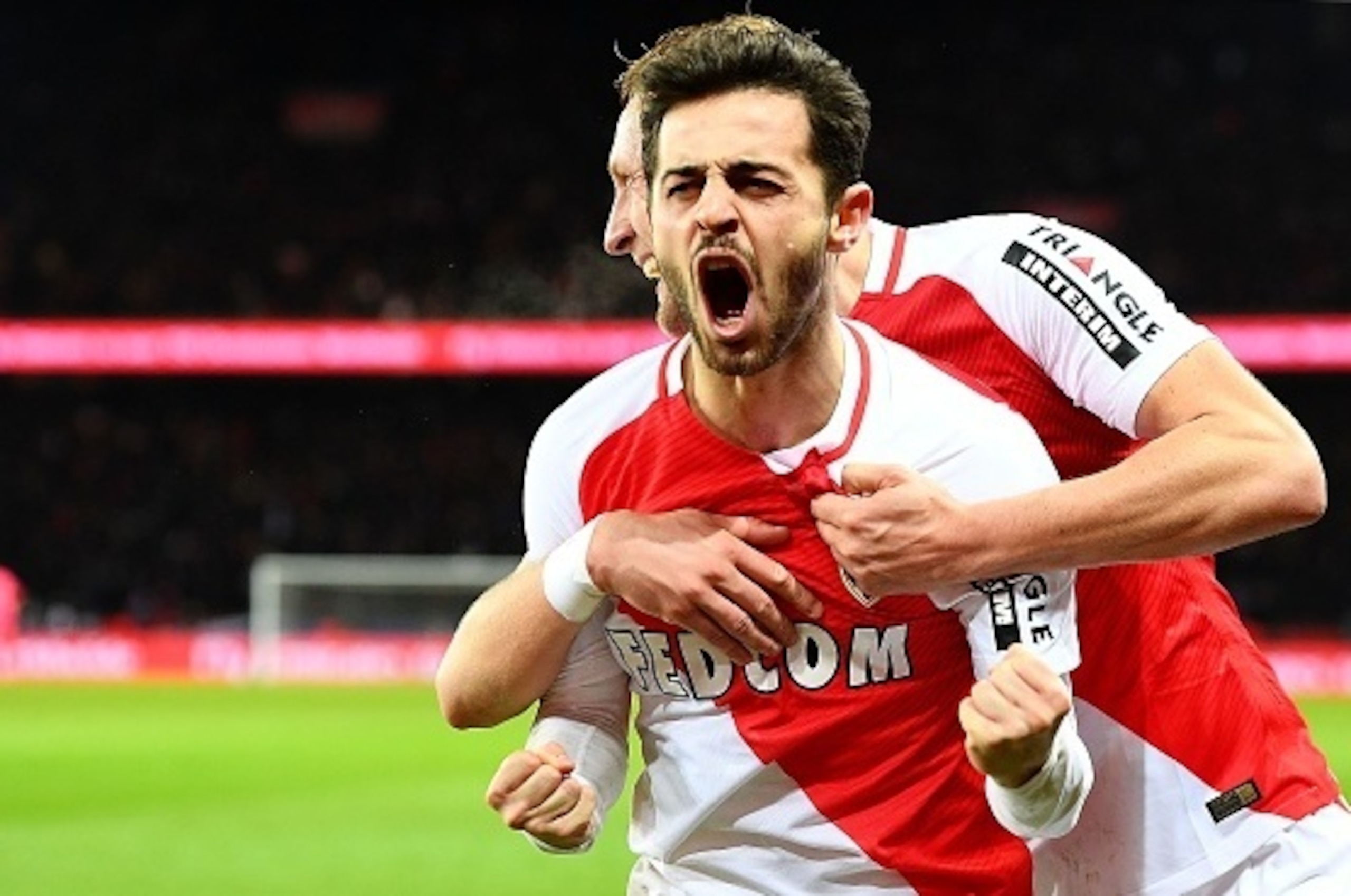 Monaco's Portuguese midfielder Bernardo Silva (C) celebrates after scoring a goal during the French L1 football match between Paris Saint-Germain and Monaco on January 29, 2017 at the Parc des Princes stadium in Paris. / AFP / FRANCK FIFE        (Photo cr