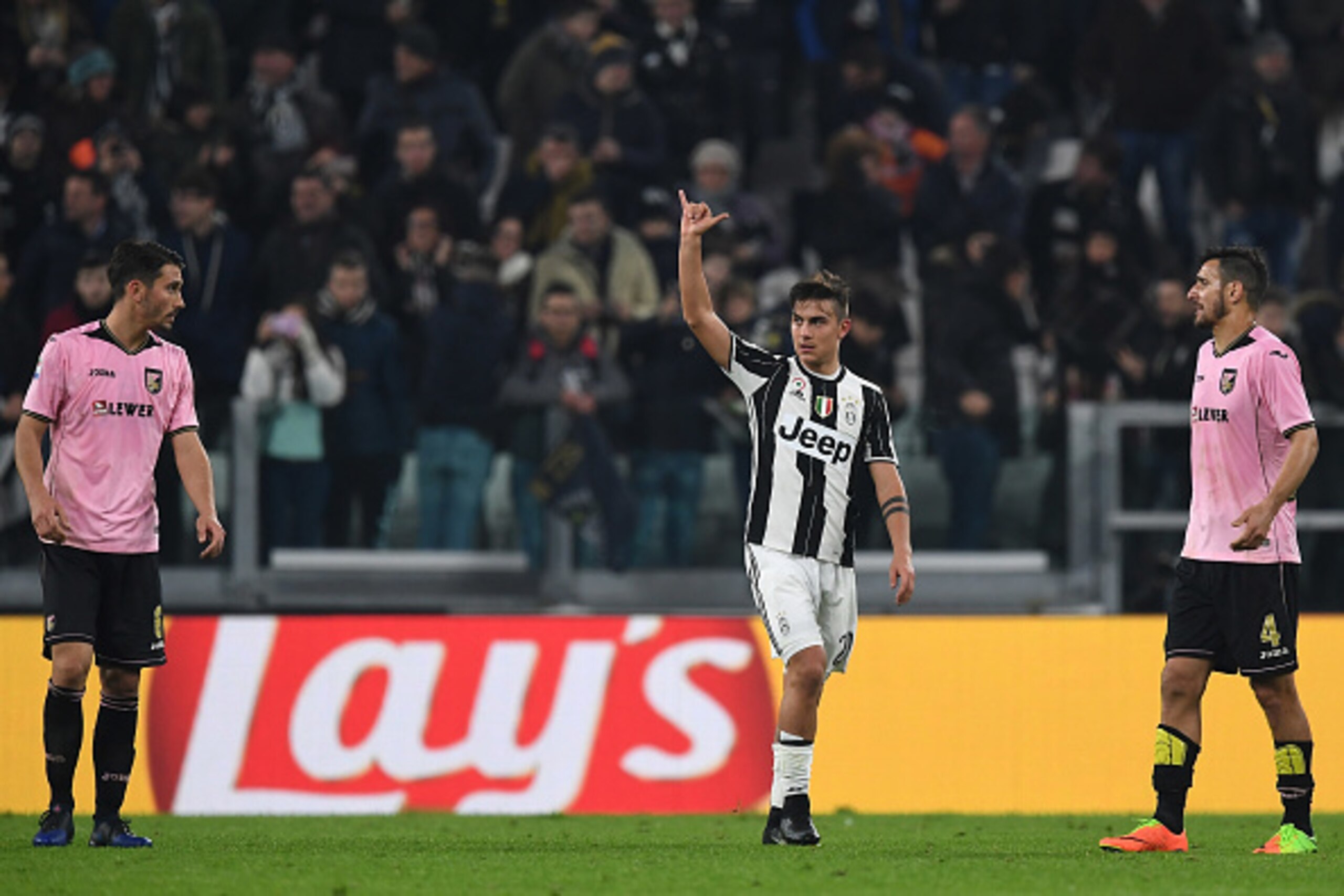 TURIN, ITALY - FEBRUARY 17:  Paulo Dybala (C) of Juventus FC celebrates his second goal during the Serie A match between Juventus FC and US Citta di Palermo at Juventus Stadium on February 17, 2017 in Turin, Italy.  (Photo by Valerio Pennicino/Getty Image