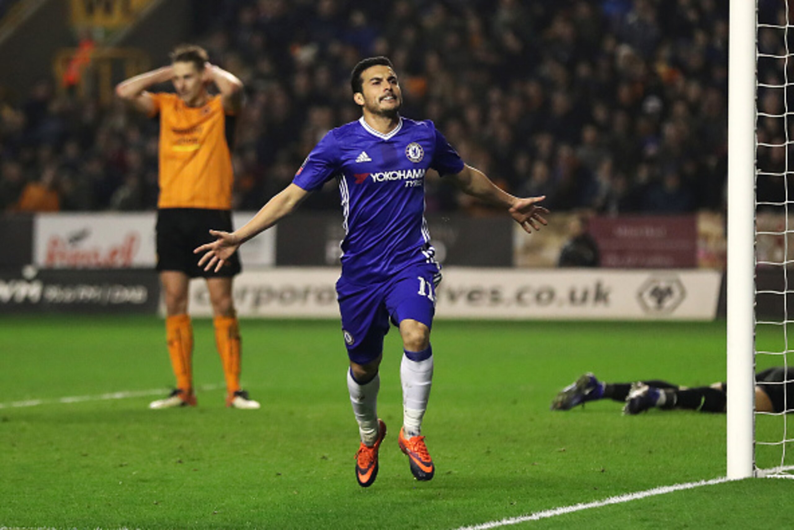 WOLVERHAMPTON, ENGLAND - FEBRUARY 18: Pedro of Chelsea celebrates scoring the opening goal during the Emirates FA Cup Fifth Round match between Wolverhampton Wanderers and Chelsea at Molineux on February 18, 2017 in Wolverhampton, England. (Photo by Chris