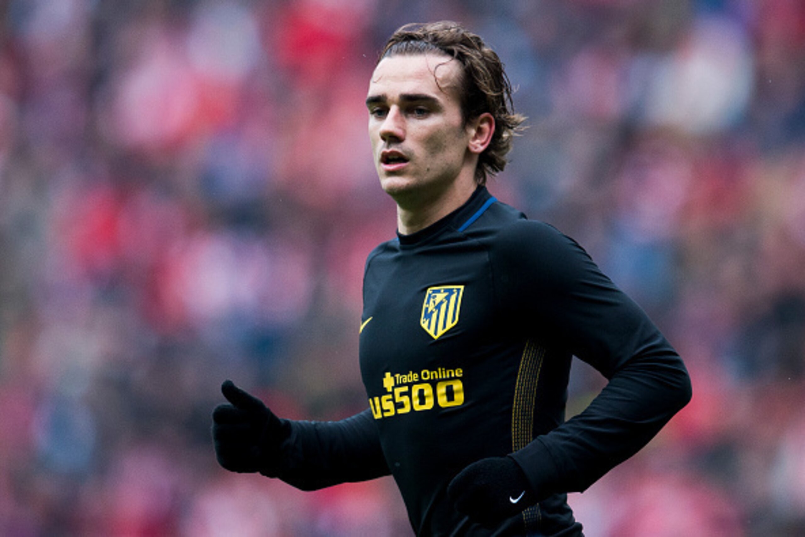 GIJON, SPAIN - FEBRUARY 18:  Antoine Griezmann of Atletico Madrid reacts during the La Liga match between Real Sporting de Gijon and Atletico Madrid at Estadio El Molinon on February 18, 2017 in Gijon, Spain.  (Photo by Juan Manuel Serrano Arce/Getty Imag