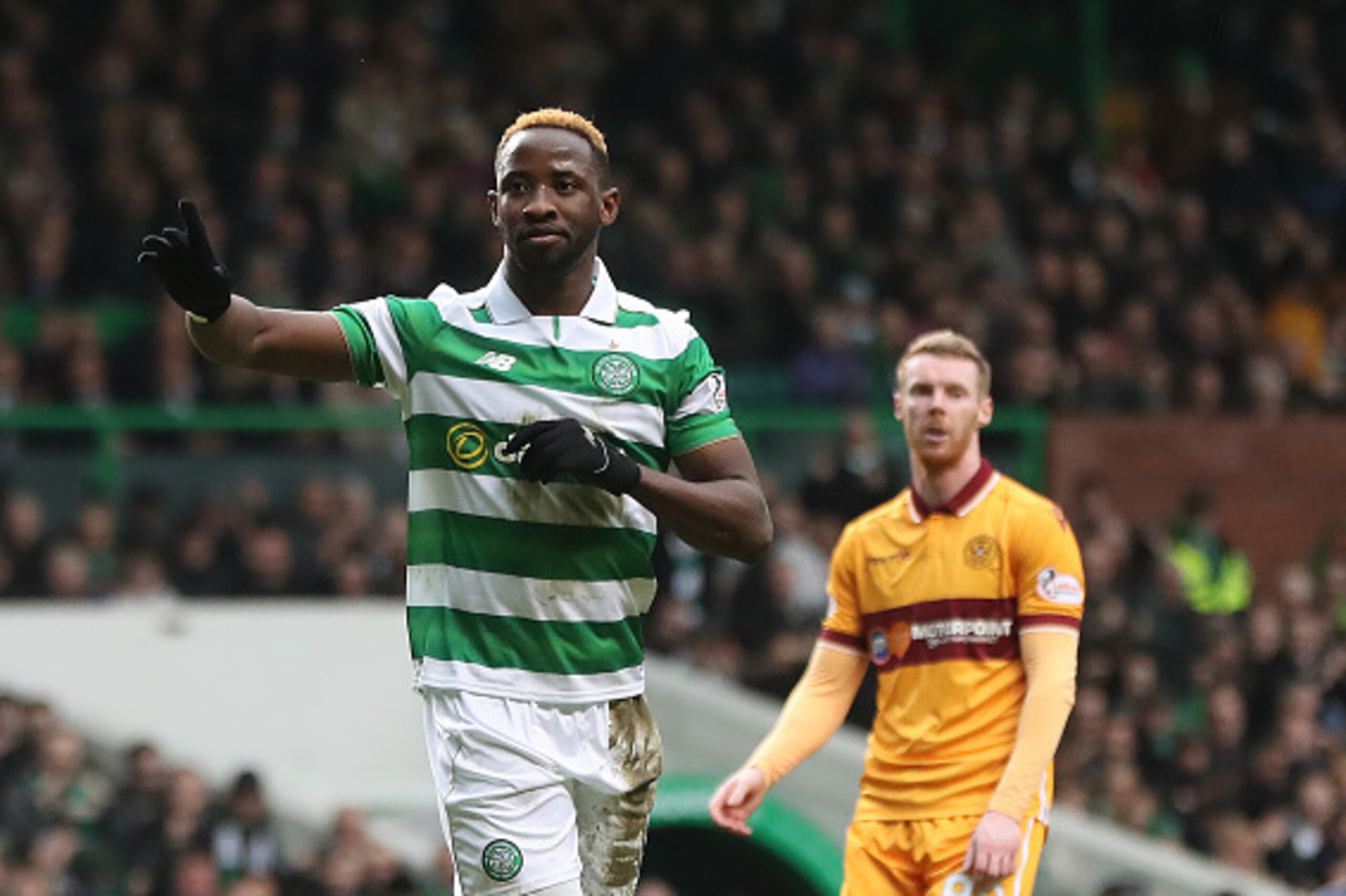 GLASGOW, SCOTLAND - FEBRUARY 18: Moussa Dembele of Celtic  celebrates after he scores the opening goal from the penalty spot during the Ladbrokes Scottish Premiership match between Celtic and  Motherwell at Celtic Park on February 18, 2017 in Glasgow, Sco