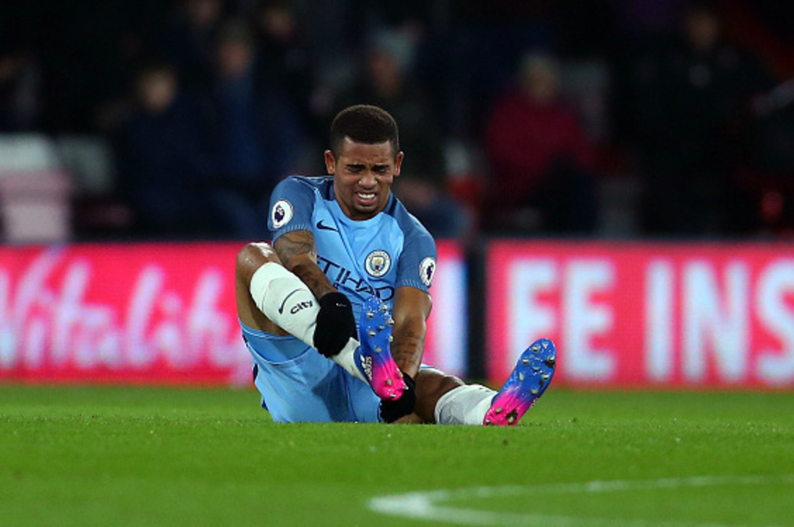BOURNEMOUTH, ENGLAND - FEBRUARY 13: An injured Gabriel Jesus of Manchester City holds his leg during the Premier League match between AFC Bournemouth and Manchester City at Vitality Stadium on February 13, 2017 in Bournemouth, England. (Photo by Catherine