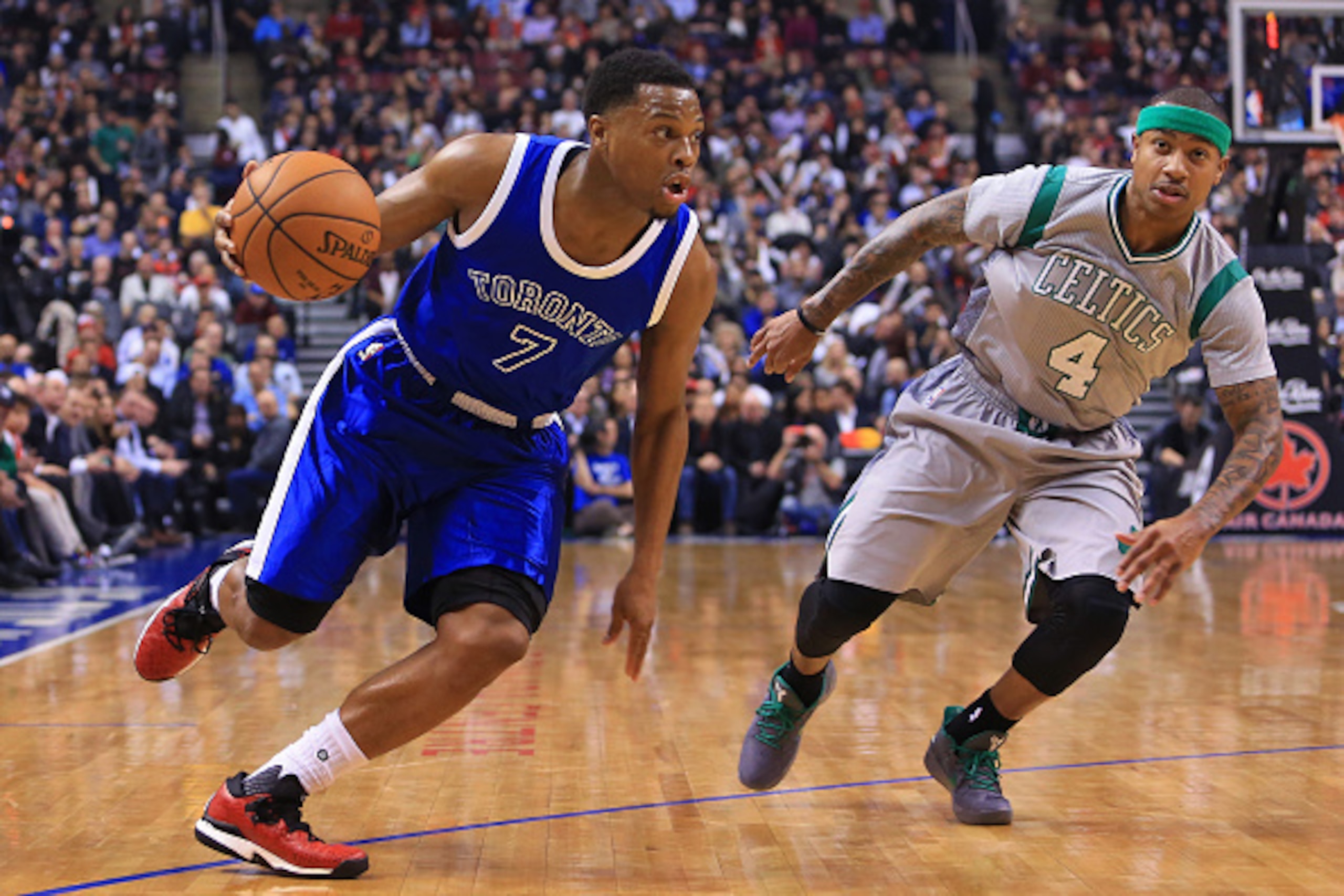 TORONTO, ON - JANUARY 10:  Kyle Lowry #7 of the Toronto Raptors dribbles the ball as Isaiah Thomas #4 of the Boston Celtics defends during the first half of an NBA game at Air Canada Centre on January 10, 2017 in Toronto, Canada.  NOTE TO USER: User expre