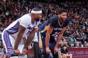 SACRAMENTO, CA - FEBRUARY 12: DeMarcus Cousins #15 of the Sacramento Kings faces off against Anthony Davis #23 of the New Orleans Pelicans on February 12, 2017 at Golden 1 Center in Sacramento, California. NOTE TO USER: User expressly acknowledges and agr