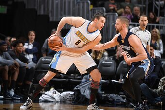 DENVER, CO - FEBRUARY 1:  Danilo Gallinari #8 of the Denver Nuggets handles the ball against the Memphis Grizzlies during the game on February 1, 2017 at the Pepsi Center in Denver, Colorado. NOTE TO USER: User expressly acknowledges and agrees that, by d