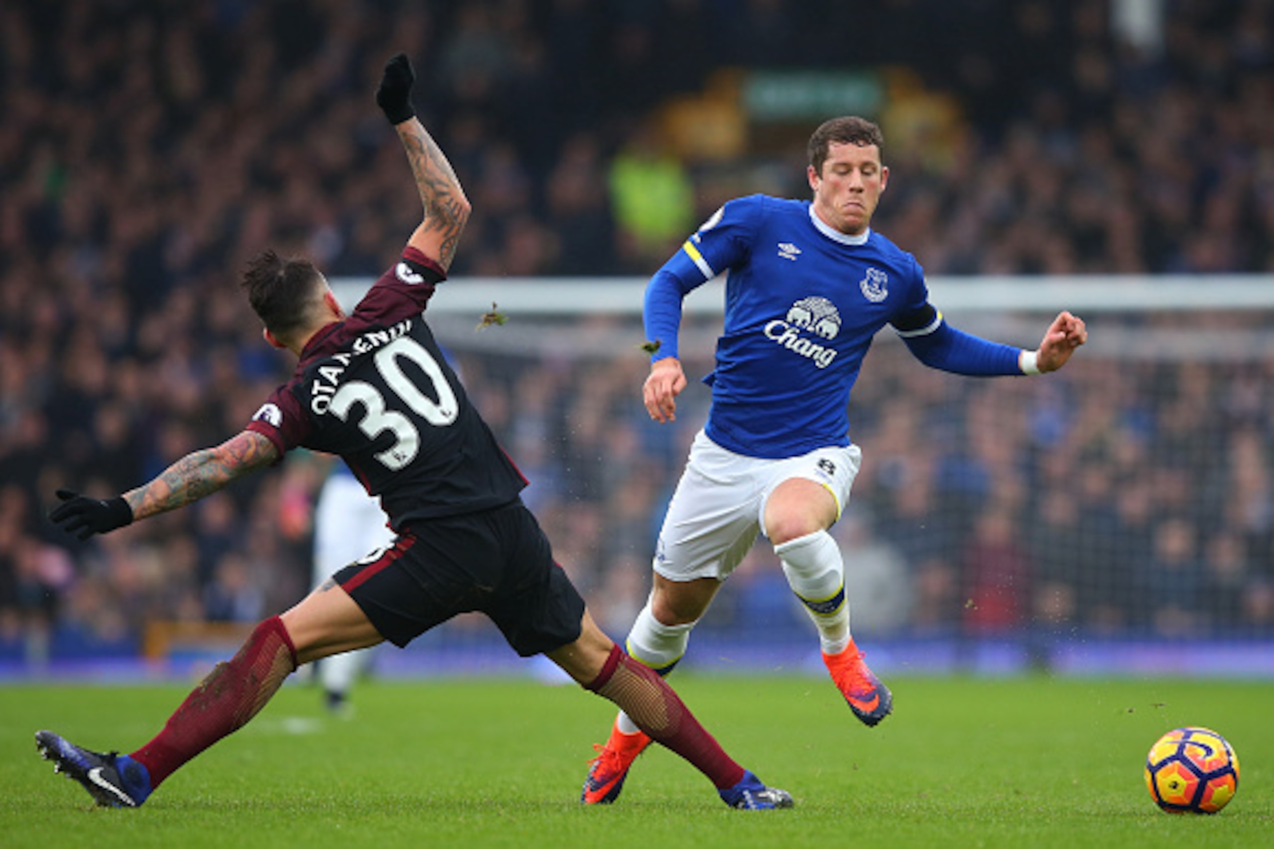 LIVERPOOL, ENGLAND - JANUARY 15:  Ross Barkley of Everton is tackled by Nicolas Otamendi of Manchester City during the Premier League match between Everton and Manchester City at Goodison Park on January 15, 2017 in Liverpool, England.  (Photo by Alex Liv