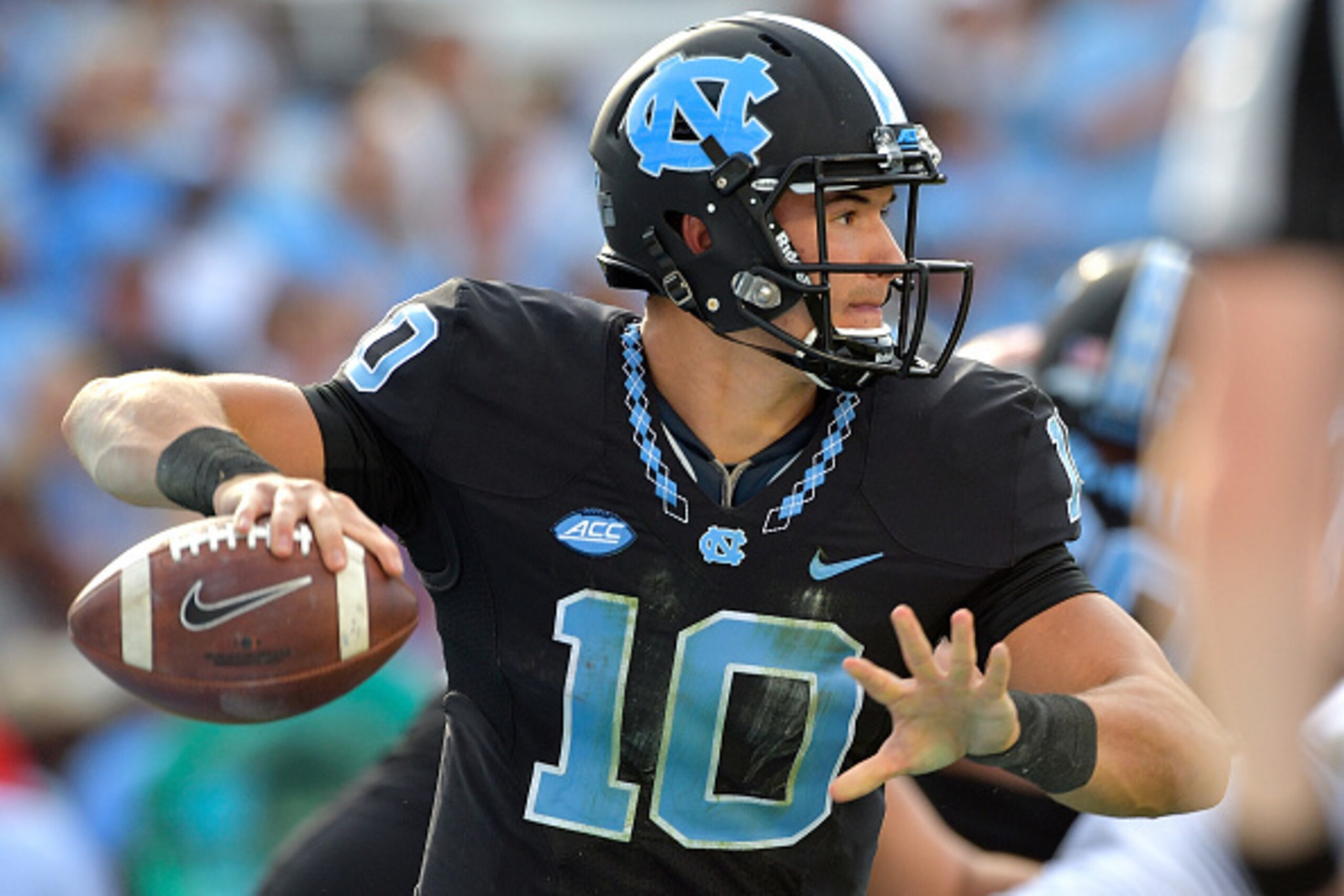 CHAPEL HILL, NC - NOVEMBER 25:  Mitch Trubisky #10 of the North Carolina Tar Heels against the North Carolina State Wolfpack during their game at Kenan Stadium on November 25, 2016 in Chapel Hill, North Carolina. North Carolina State won 28-21.  (Photo by