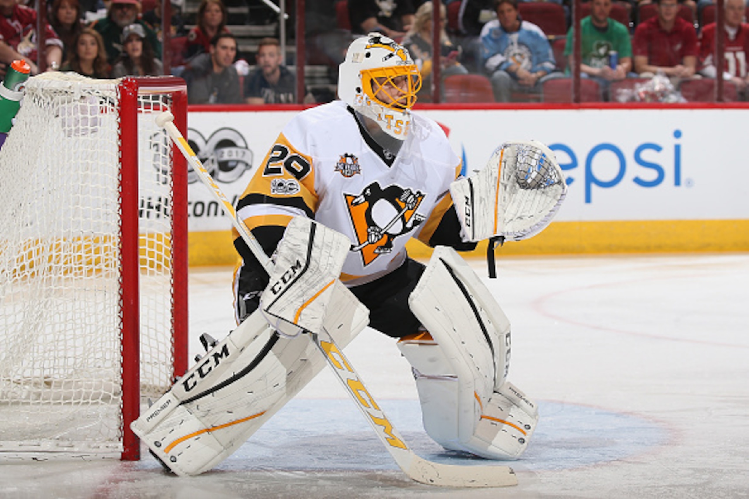 GLENDALE, AZ - FEBRUARY 11:  Goaltender Marc-Andre Fleury #29 of the Pittsburgh Penguins in action during the NHL game against the Arizona Coyotes at Gila River Arena on February 11, 2017 in Glendale, Arizona. The Coyotes defeated the Penguins 4-3 in over
