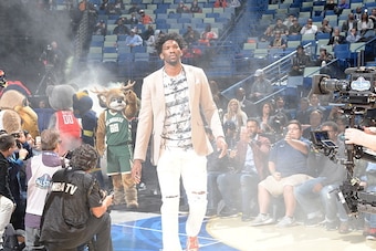 NEW ORLEANS, LA - FEBRUARY 17:  Joel Embiid #21 of the World Team gets introduced before the BBVA Compass Rising Stars Challenge as part of 2017 All-Star Weekend at the Smoothie King Center on February 17, 2017 in New Orleans, Louisiana. NOTE TO USER: Use