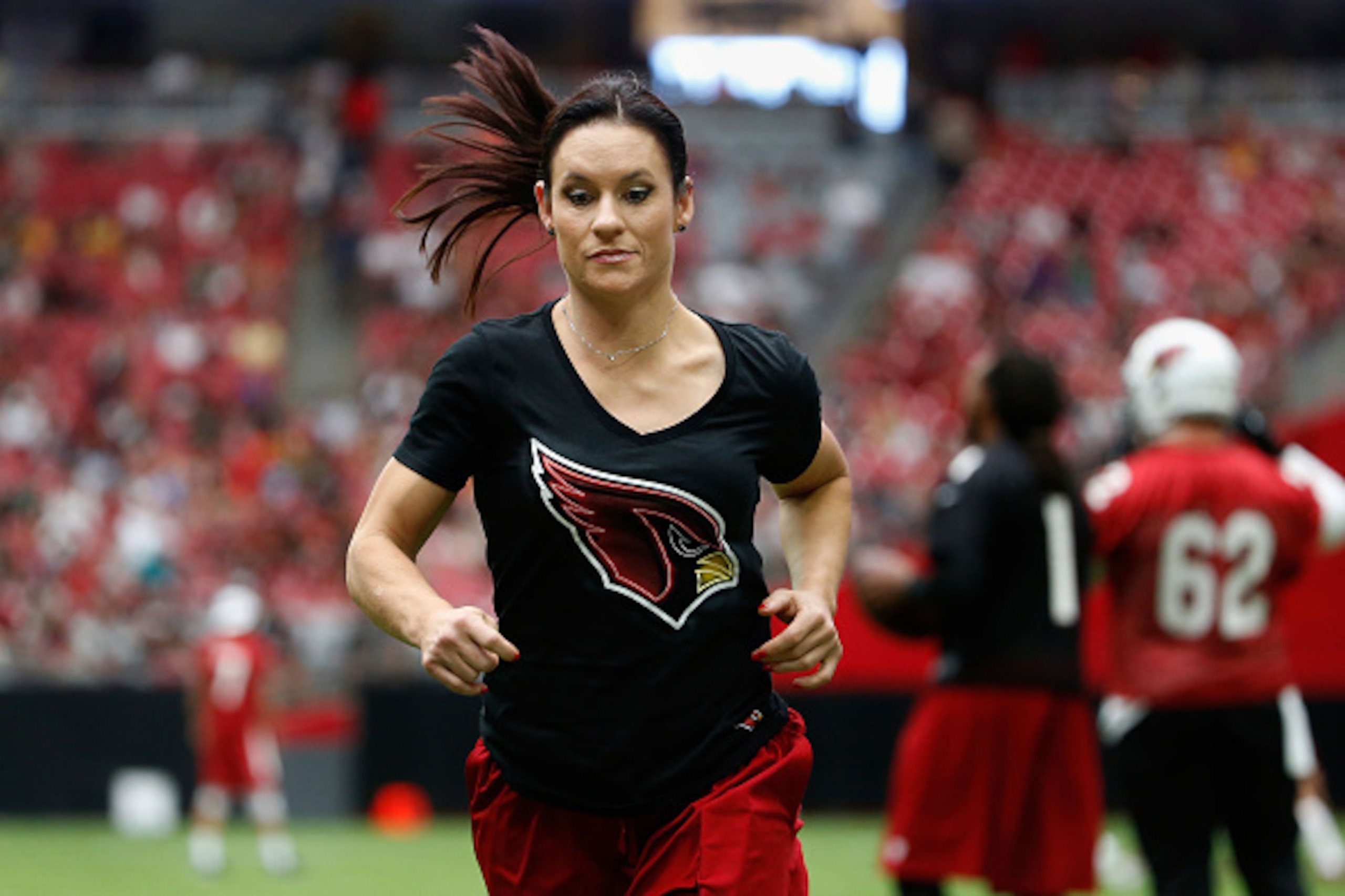GLENDALE, AZ - AUGUST 01:  Intern linebacker coach Jen Welter of the Arizona Cardinals on the field during the team training camp at University of Phoenix Stadium on August 1, 2015 in Glendale, Arizona.  (Photo by Christian Petersen/Getty Images)