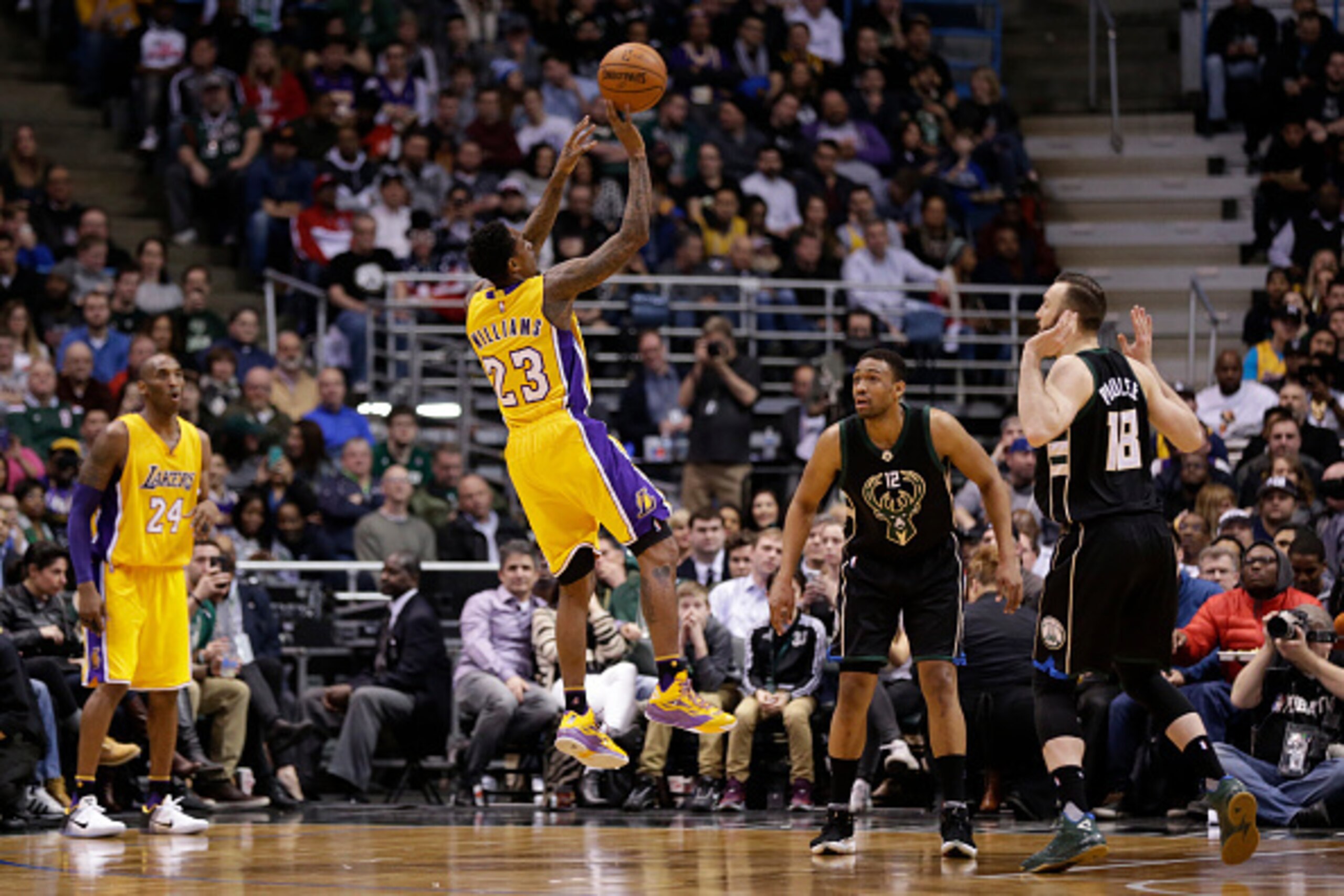 MILWAUKEE, WI - FEBRUARY 22: Lou Williams #23 of the Los Angeles Lakers shoots a jumper during the game against the Milwaukee Bucks at BMO Harris Bradley Center on February 22, 2016 in Milwaukee, Wisconsin. NOTE TO USER: User expressly acknowledges and ag