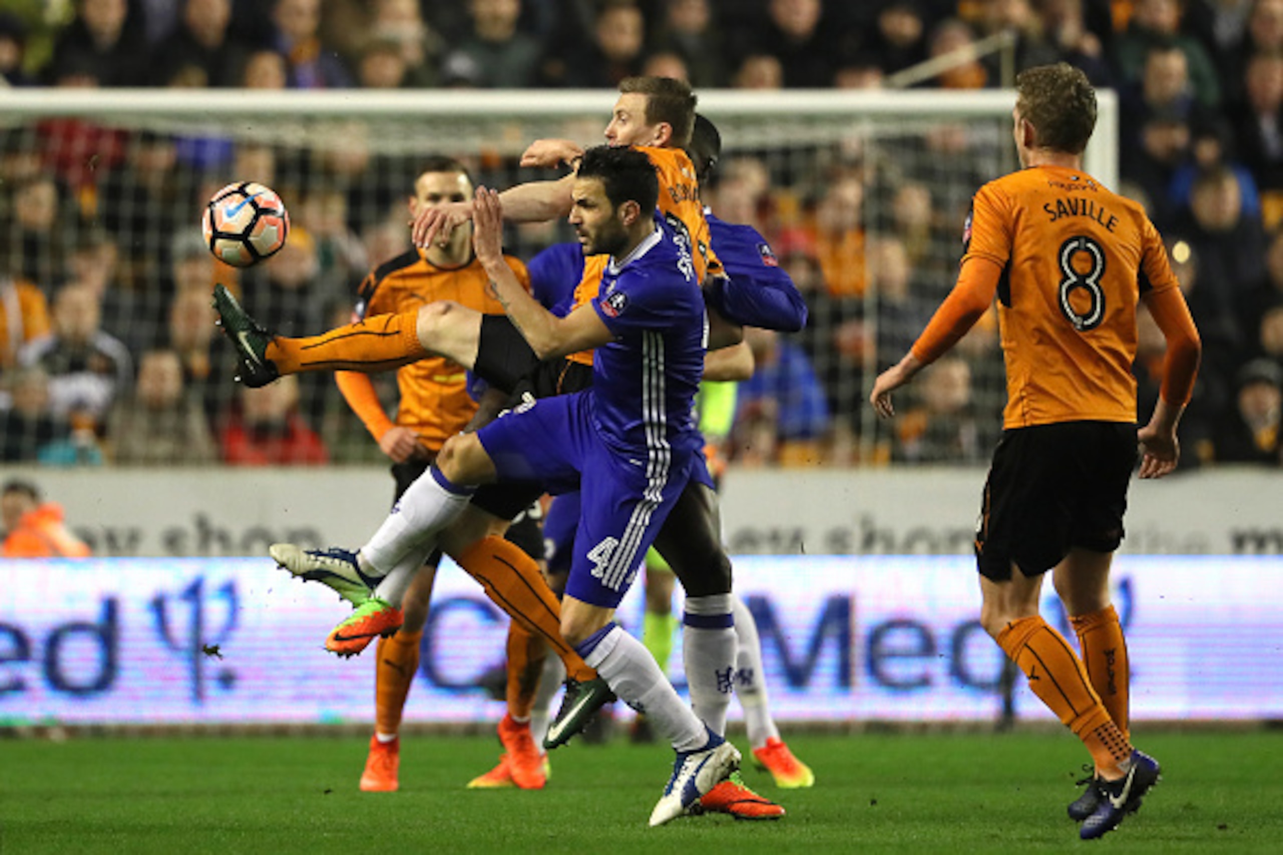 WOLVERHAMPTON, ENGLAND - FEBRUARY 18: Jon Dadi Bodvarsson of Wolverhampton Wanderers competes with Cesc Fabregas of Chelsea during the Emirates FA Cup Fifth Round match between Wolverhampton Wanderers and Chelsea at Molineux on February 18, 2017 in Wolve WOLVERHAMPTON, ENGLAND - FEBRUARY 18: Jon Dadi Bodvarsson of Wolverhampton Wanderers competes with Cesc Fabregas of Chelsea during the Emirates FA Cup Fifth Round match between Wolverhampton Wanderers and Chelsea at Molineux on February 18, 2017 in Wolve