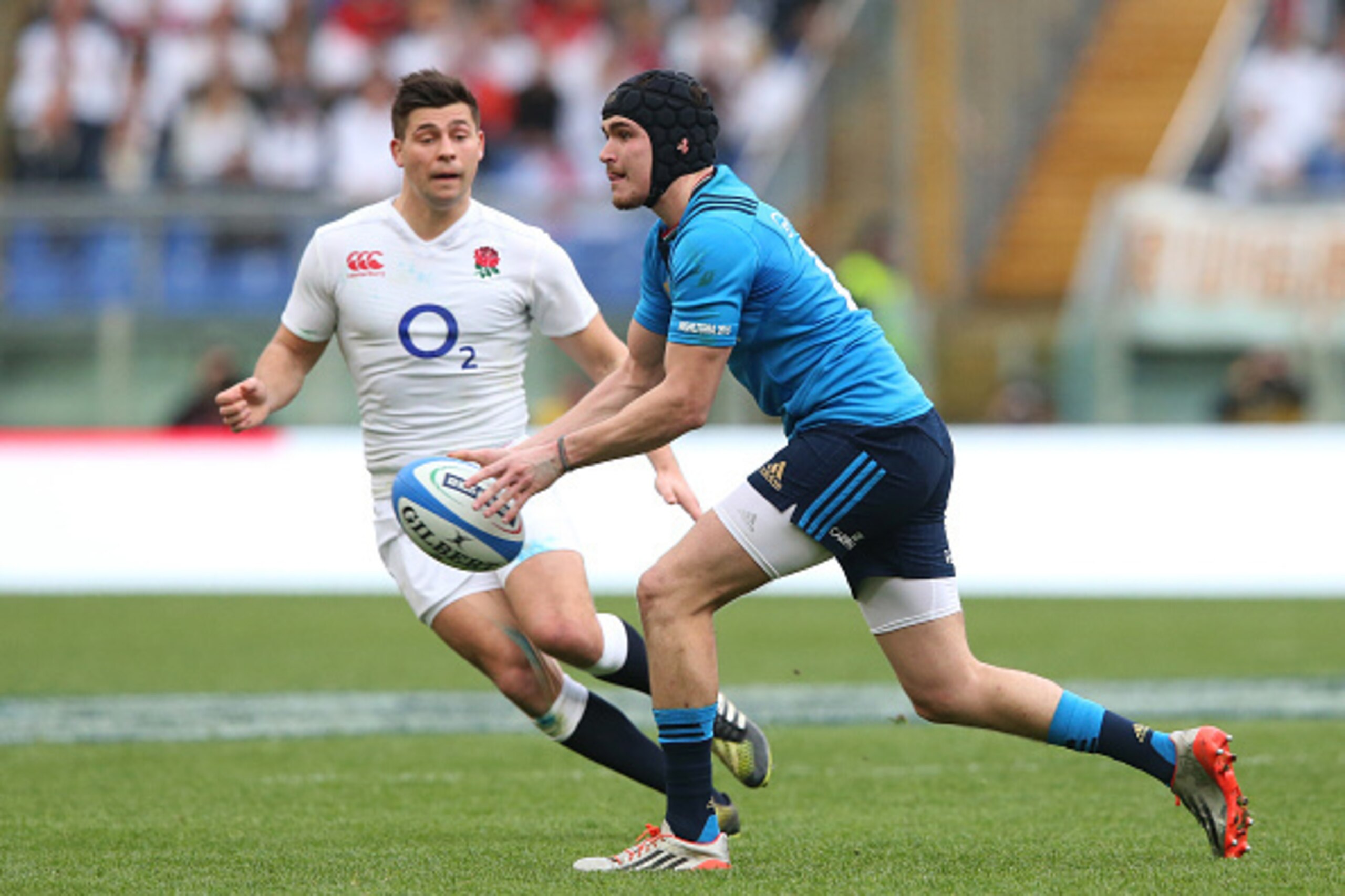 ROME, ITALY - FEBRUARY 14:  Carlo Canna of Italy passes as Ben Youngs of England closes in during the RBS Six Nations match between Italy and England at the Stadio Olimpico on February 14, 2016 in Rome, Italy.  (Photo by David Rogers/Getty Images)