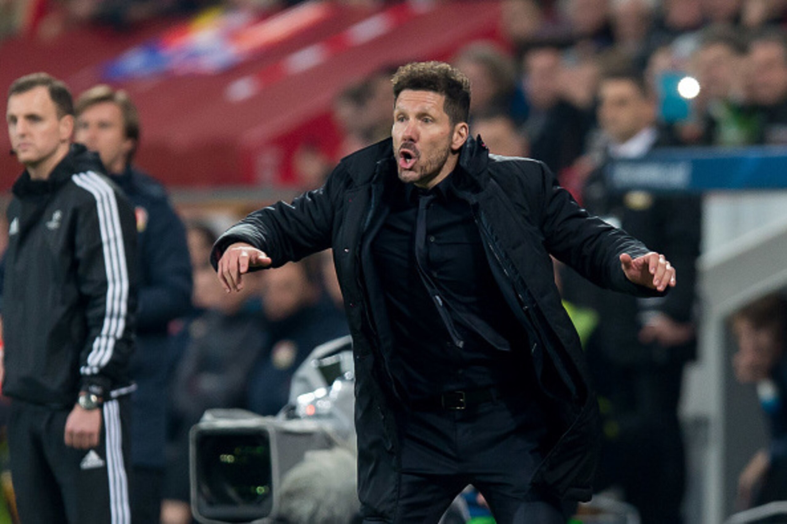 LEVERKUSEN, GERMANY - FEBRUARY 21: Head coach Diego Simeone of Atletico Madrid gestures during the UEFA Champions League Round of 16 first leg match between Bayer Leverkusen and Club Atletico de Madrid at BayArena on February 21, 2017 in Leverkusen, Germa
